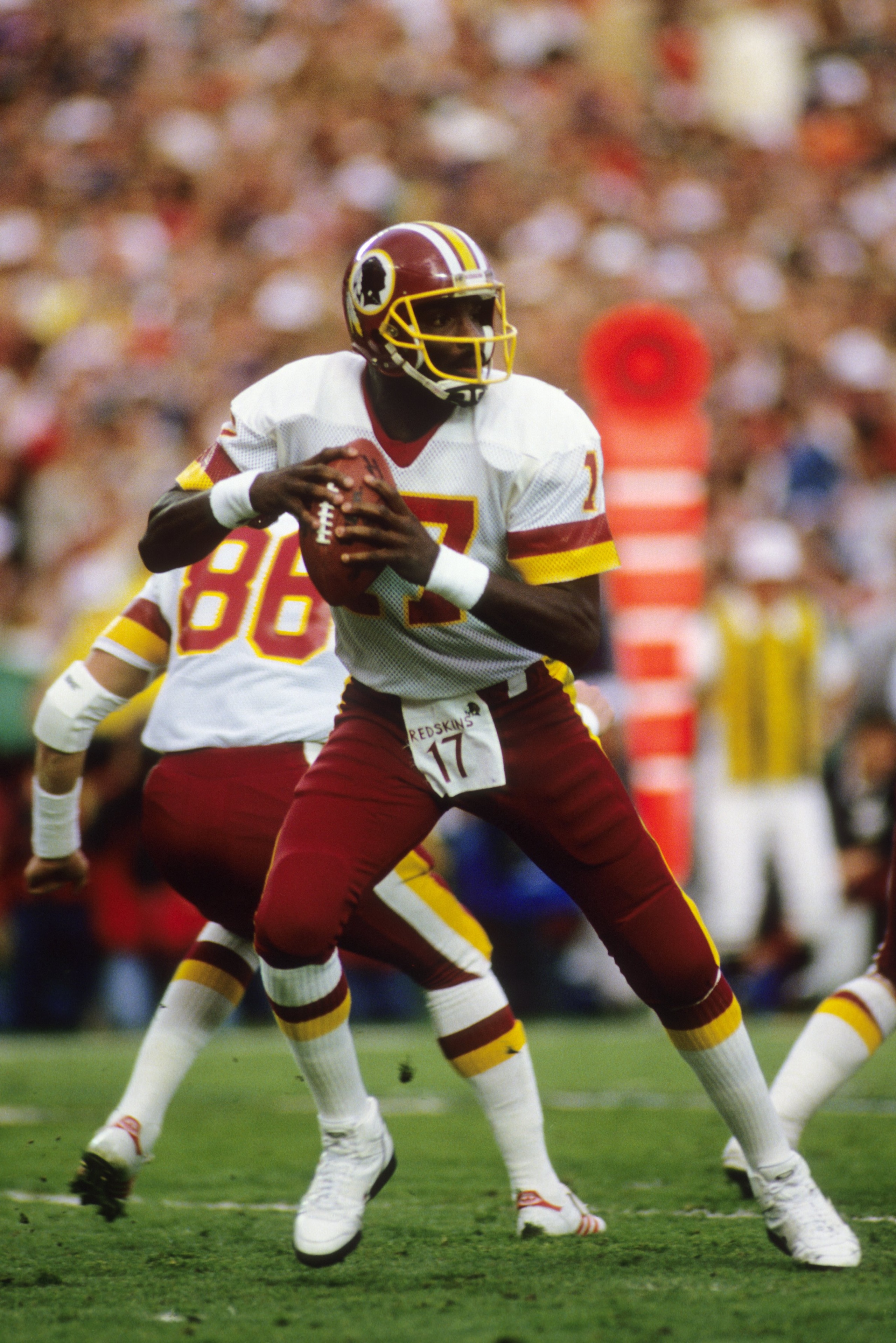 SAN DIEGO - JANUARY 31: Quarterback Doug Williams #10 of the Washington Redskins drops back to pass during Super Bowl XXII against the Denver Broncos at Jack Murphy Stadium on January 31, 1988 in San Diego, California. The Redskins won 42-10. (Photo by SAN DIEGO - JANUARY 31: Quarterback Doug Williams #10 of the Washington Redskins drops back to pass during Super Bowl XXII against the Denver Broncos at Jack Murphy Stadium on January 31, 1988 in San Diego, California. The Redskins won 42-10. (Photo by