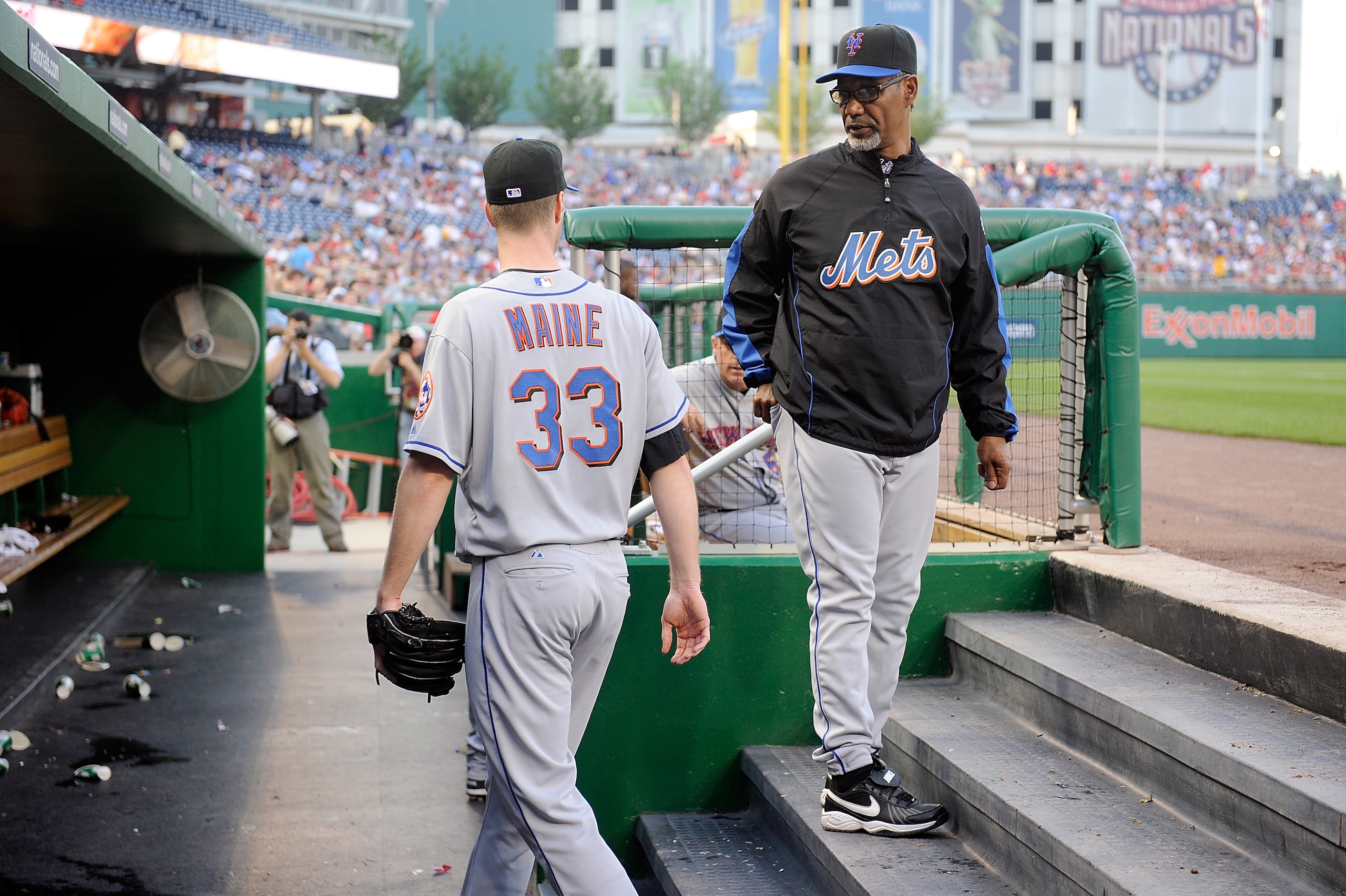 WASHINGTON - MAY 20:  John Maine #33 of the New York Mets talks to manager Jerry Manuel after being removed in the first inning of the game against the Washington Nationals at Nationals Park on May 20, 2010 in Washington, DC.  (Photo by Greg Fiume/Getty I