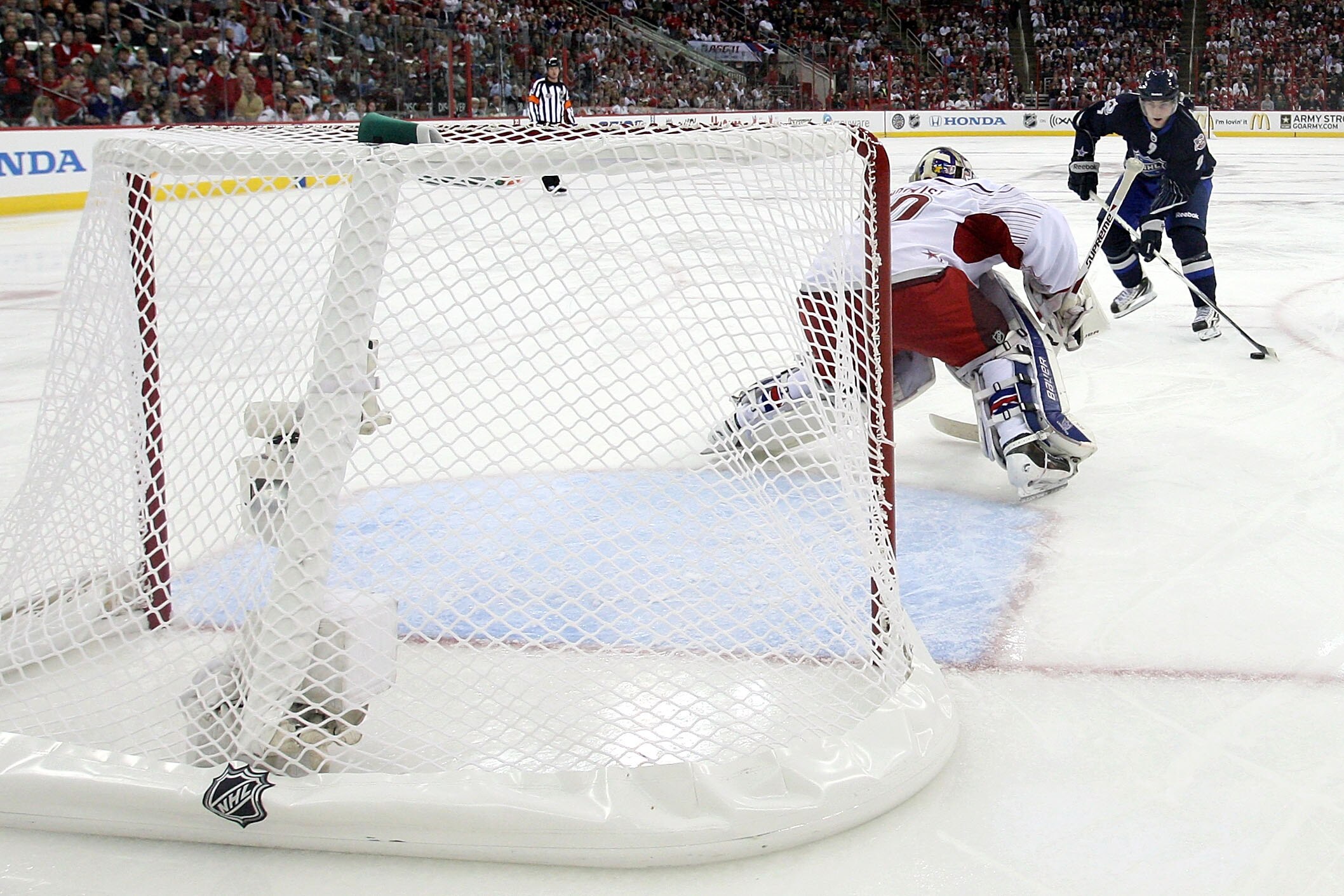 RALEIGH, NC - JANUARY 30:  Henrik Lundqvist #30 of New York Rangers defends against a third period penalty shot by Team Lidstrom player Matt Duchene #9 of the Colorado Avalanche in the 58th NHL All-Star Game at RBC Center on January 30, 2011 in Raleigh, N