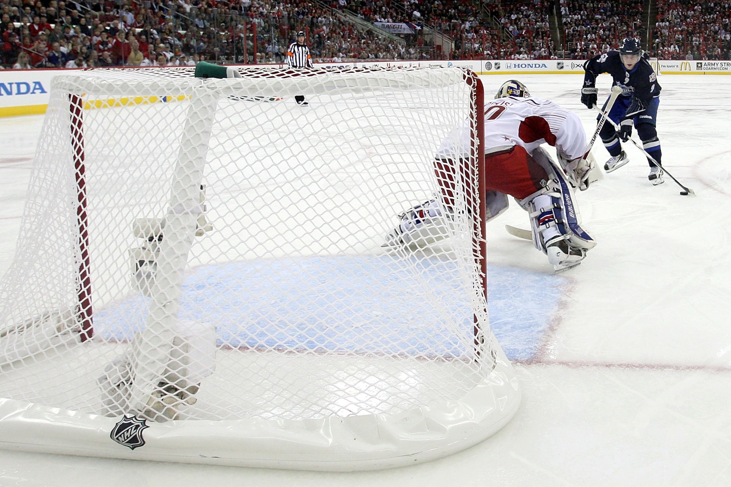 RALEIGH, NC - JANUARY 30:  Henrik Lundqvist #30 of New York Rangers defends against a third period penalty shot by Team Lidstrom player Matt Duchene #9 of the Colorado Avalanche in the 58th NHL All-Star Game at RBC Center on January 30, 2011 in Raleigh, N