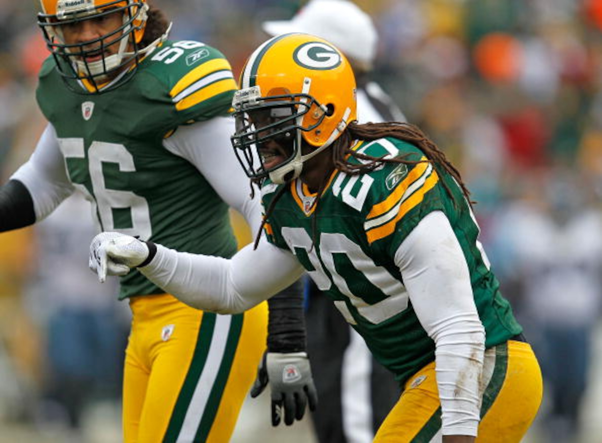 GREEN BAY, WI - DECEMBER 27: Atari Bigby #20 of the Green Bay Packers celebrates one of his two interceptions against the Seattle Seahawks at Lambeau Field on December 27, 2009 in Green Bay, Wisconsin. The Packers defeated the Seahawks 48-10. (Photo by Jo