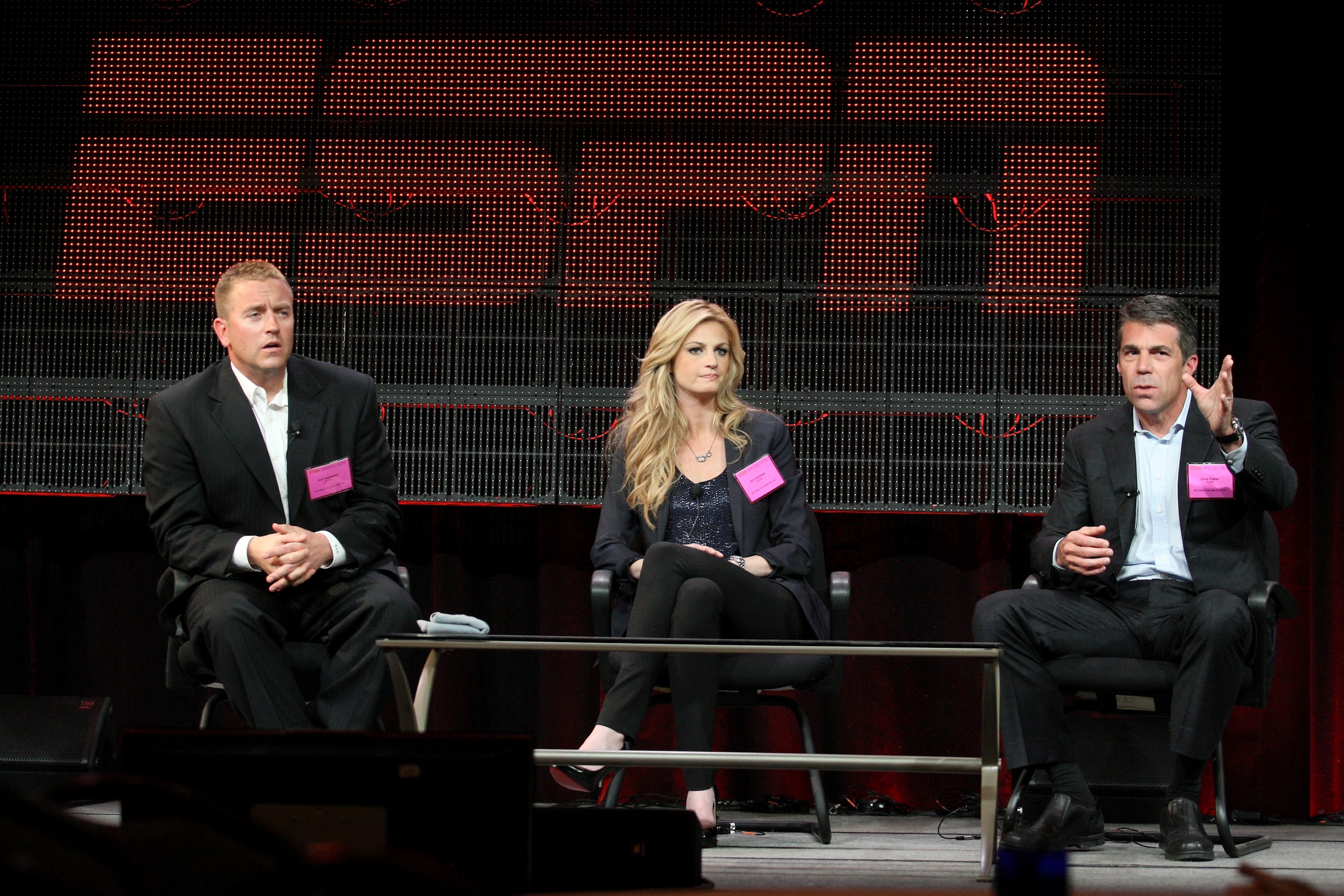 PASADENA, CA - JANUARY 05:  (L-R)Broadcasters Kirk Herbstreit, Erin Andrews and Chris Fowler speak onstage during the 'BCS Title Game' panel at the ESPN portion of the 2011 Winter TCA press tour held at the Langham Hotel on January 5, 2011 in Pasadena, Ca