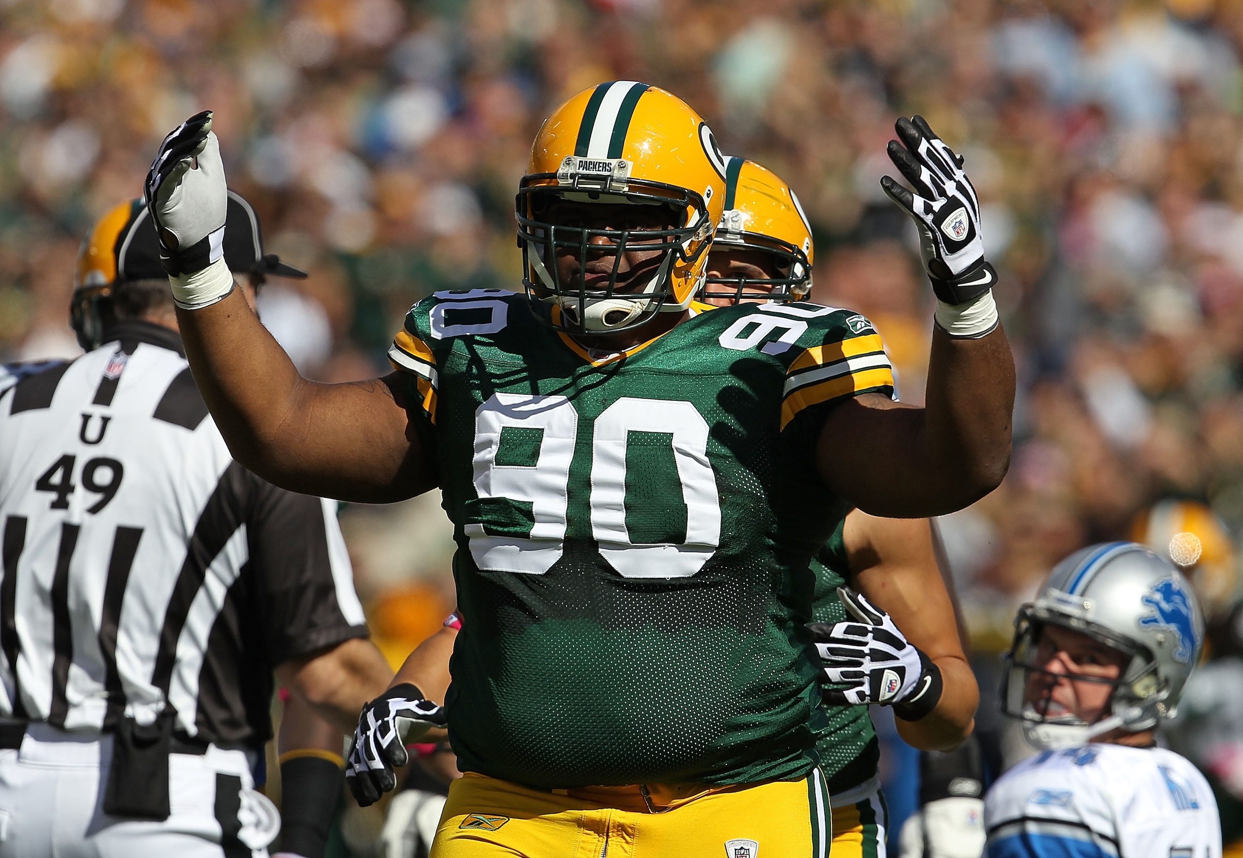 GREEN BAY, WI - OCTOBER 03: B.J. Raji #90 of the Green Bay Packers celebrates a defensive stop against the Detroit Lions at Lambeau Field on October 3, 2010 in Green Bay, Wisconsin. The Packers defeated the Lions 28-26. (Photo by Jonathan Daniel/Getty Ima GREEN BAY, WI - OCTOBER 03: B.J. Raji #90 of the Green Bay Packers celebrates a defensive stop against the Detroit Lions at Lambeau Field on October 3, 2010 in Green Bay, Wisconsin. The Packers defeated the Lions 28-26. (Photo by Jonathan Daniel/Getty Ima