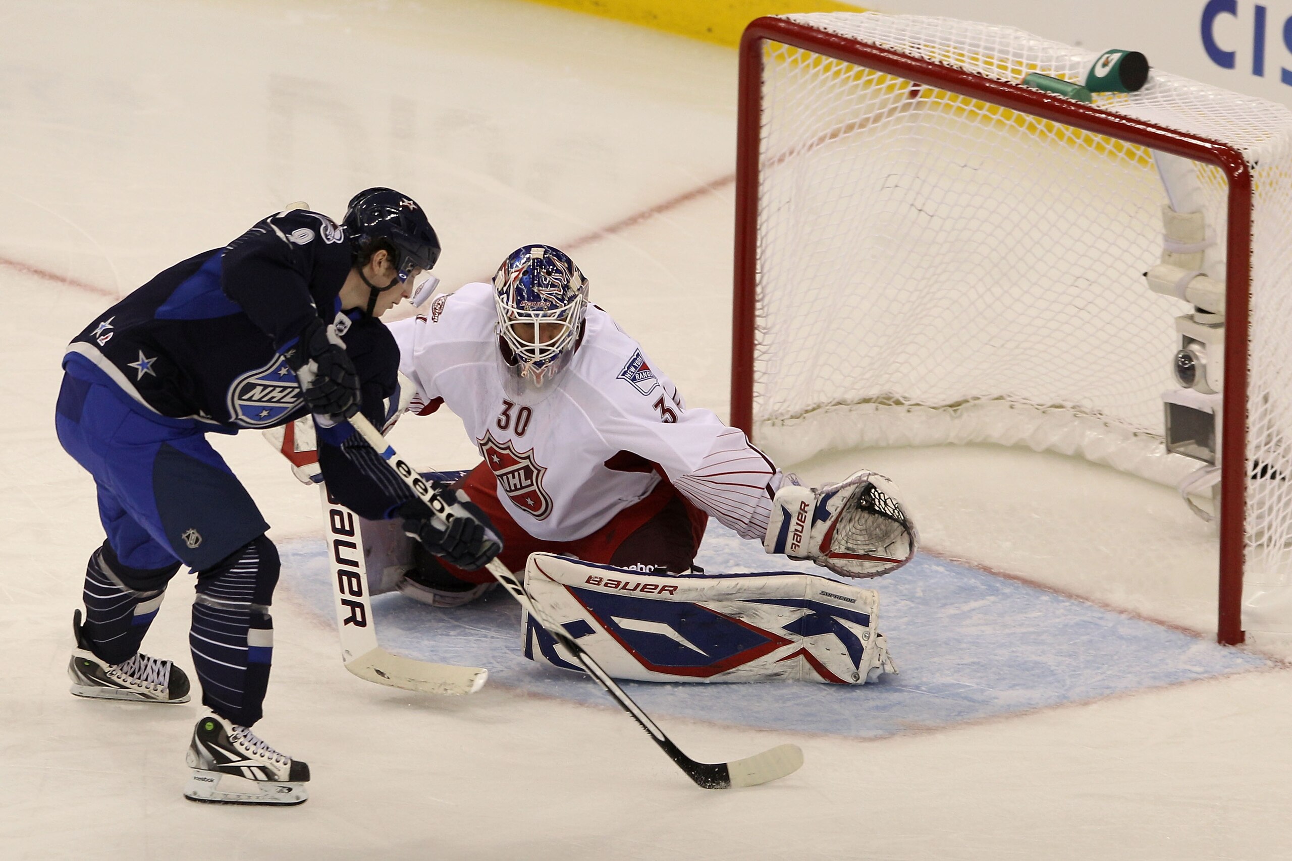 RALEIGH, NC - JANUARY 30:  Henrik Lundqvist #30 of New York Rangers makes a save on a third period penalty shot by Team Lidstrom player Matt Duchene #9 of the Colorado Avalanche in the 58th NHL All-Star Game at RBC Center on January 30, 2011 in Raleigh, N
