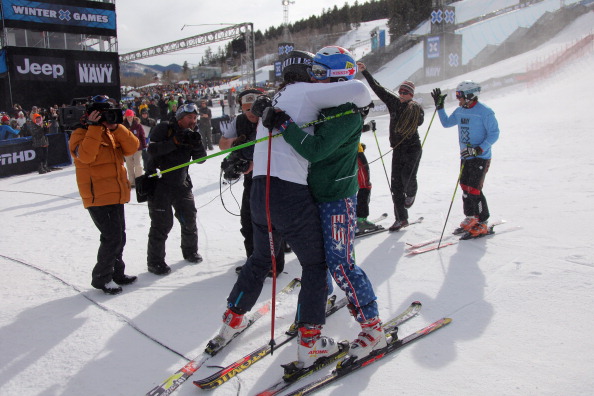 ASPEN, CO - JANUARY 30: John Teller (white) of Mammoth Lakes, California is congratulated bby third place finisher Casey Puckett (green) of Aspen, Colorado in the Men's Skier X at Winter X Games 15 at Buttermilk Mountain on January 30, 2011 in Aspen, Col