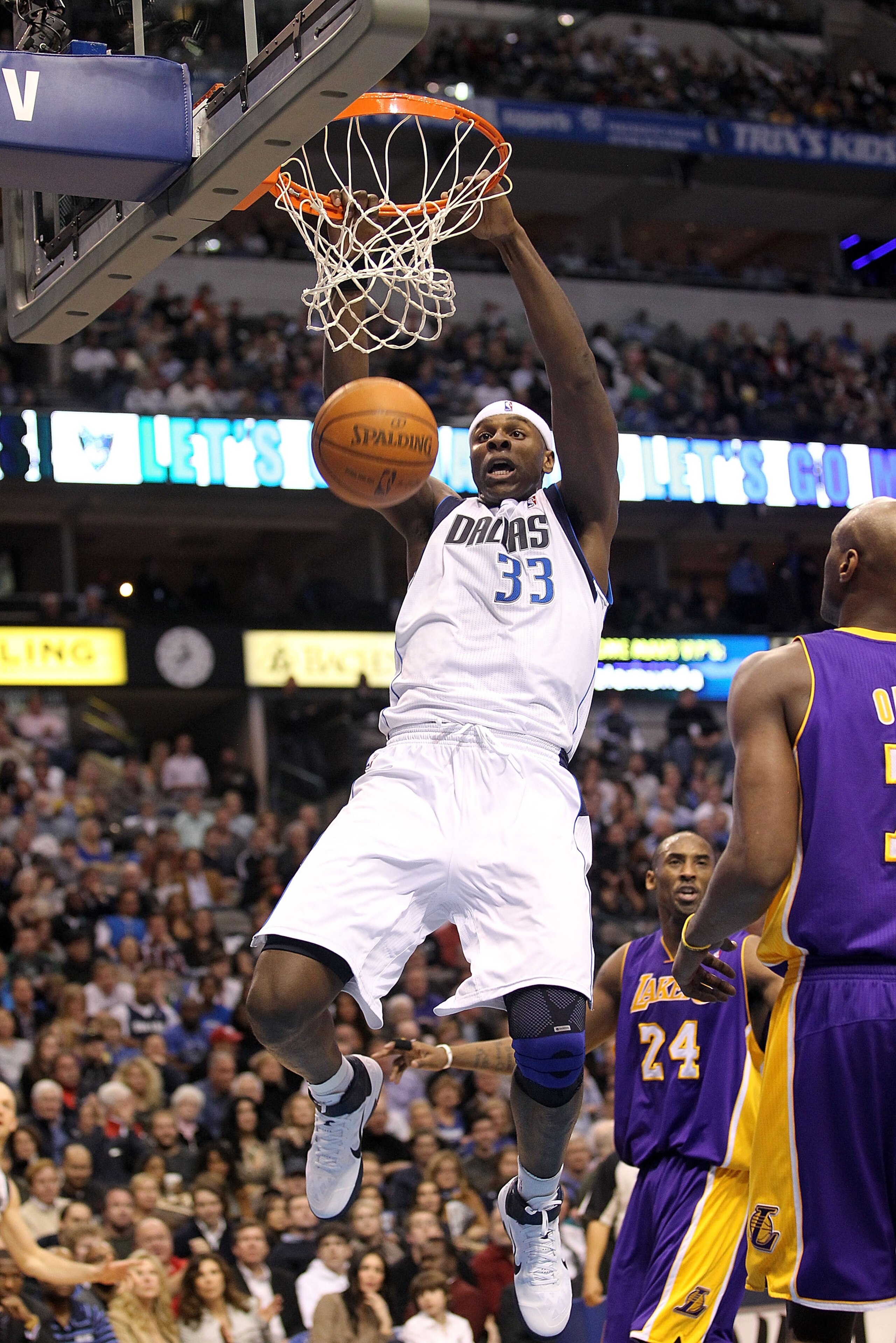 DALLAS, TX - JANUARY 19:  Center Brendan Haywood #33 of the Dallas Mavericks makes the slam dunk against the Los Angeles Lakers at American Airlines Center on January 19, 2011 in Dallas, Texas.  NOTE TO USER: User expressly acknowledges and agrees that, b