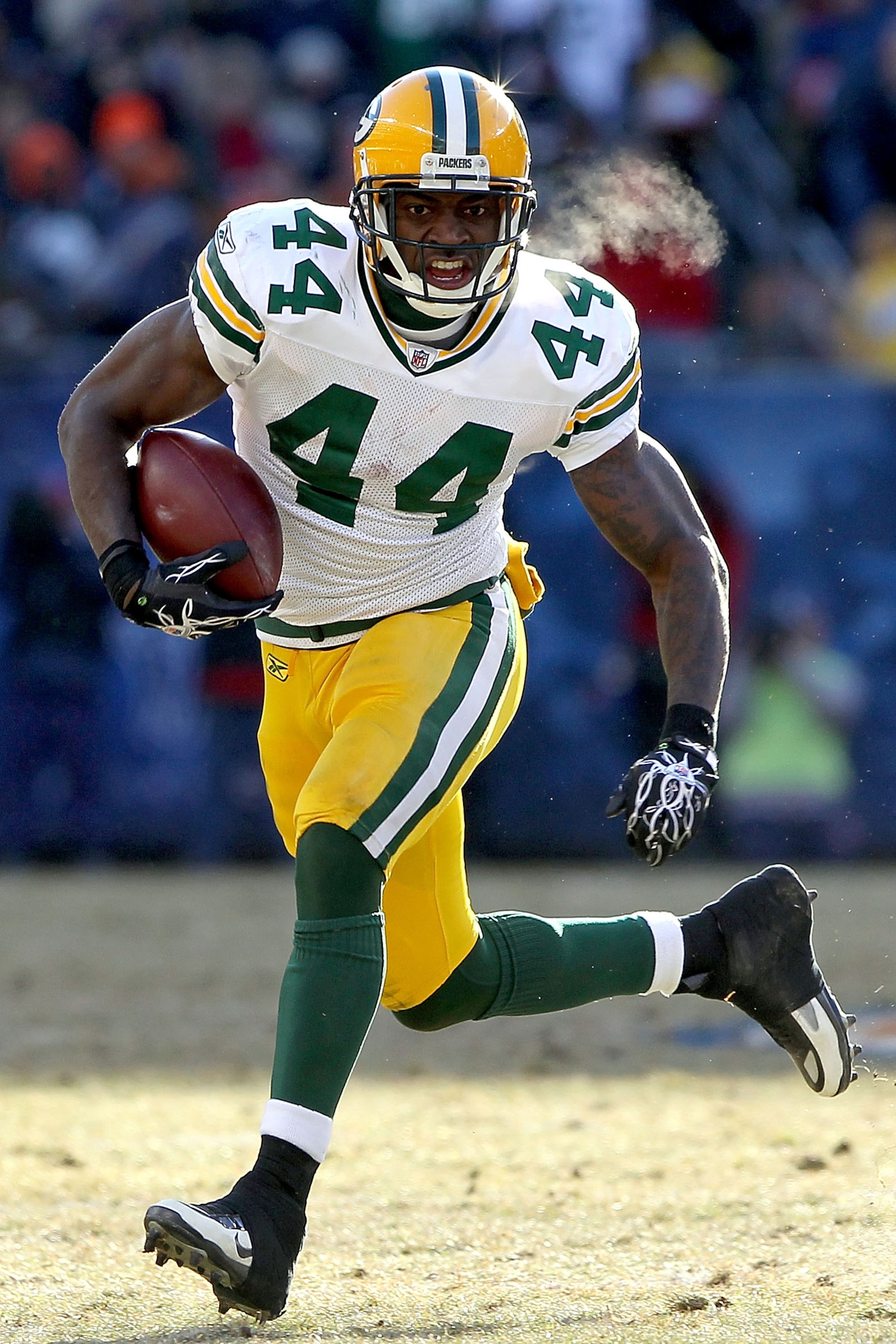 CHICAGO, IL - JANUARY 23: Running back James Starks #44 of the Green Bay Packers runs the ball against the Chicago Bears in the first half of the NFC Championship Game at Soldier Field on January 23, 2011 in Chicago, Illinois. (Photo by Doug Pensinger/G CHICAGO, IL - JANUARY 23: Running back James Starks #44 of the Green Bay Packers runs the ball against the Chicago Bears in the first half of the NFC Championship Game at Soldier Field on January 23, 2011 in Chicago, Illinois. (Photo by Doug Pensinger/G