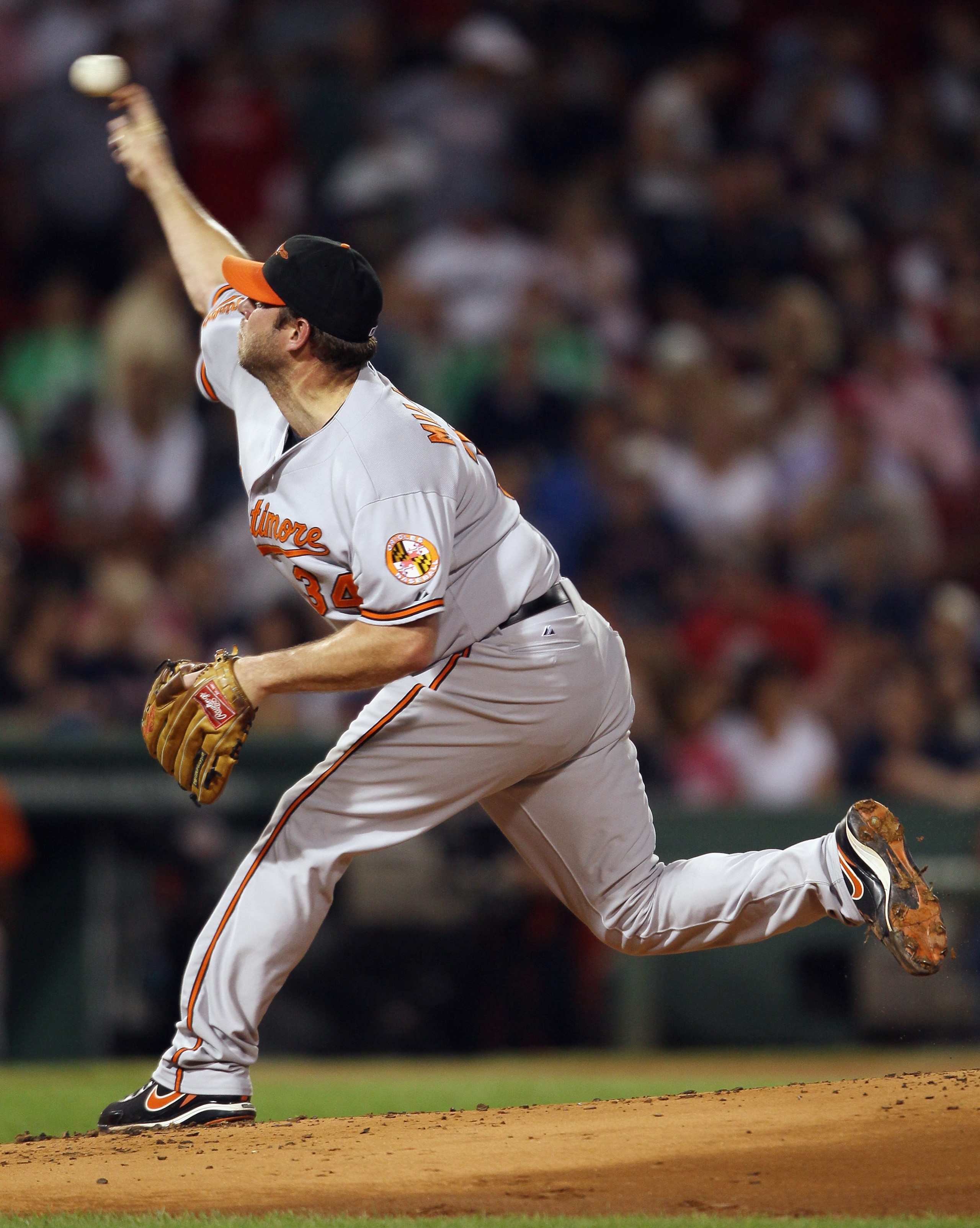 BOSTON - SEPTEMBER 22:  Kevin Millwood #34 of the Baltimore Orioles delivers a pitch in the first inning against the Boston Red Sox on September 22, 2010 at Fenway Park in Boston, Massachusetts.  (Photo by Elsa/Getty Images)
