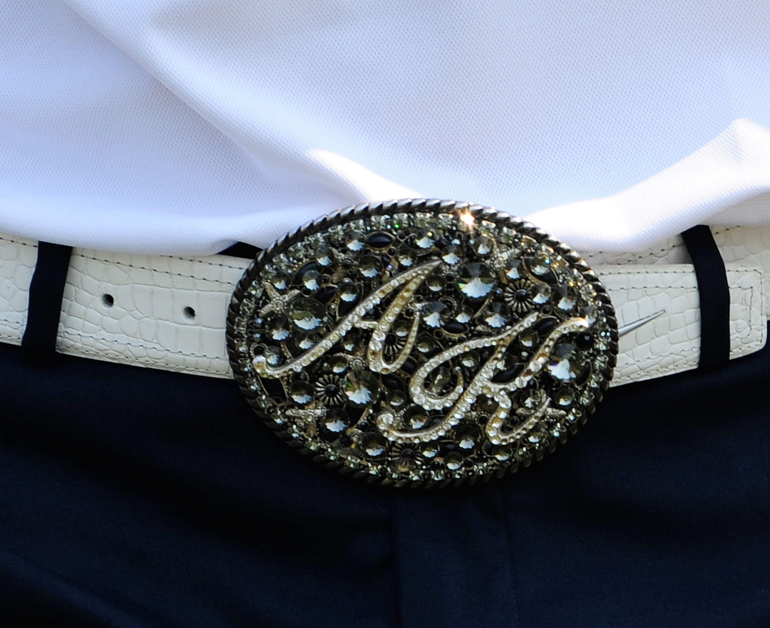 PALM BEACH GARDENS, FL - MARCH 06: A closeup view of Anthony Kim's belt buckle during the third round of the Honda Classic at PGA National Resort And Spa on March 6, 2010 in Palm Beach Gardens, Florida. (Photo by Sam Greenwood/Getty Images) PALM BEACH GARDENS, FL - MARCH 06: A closeup view of Anthony Kim's belt buckle during the third round of the Honda Classic at PGA National Resort And Spa on March 6, 2010 in Palm Beach Gardens, Florida. (Photo by Sam Greenwood/Getty Images)