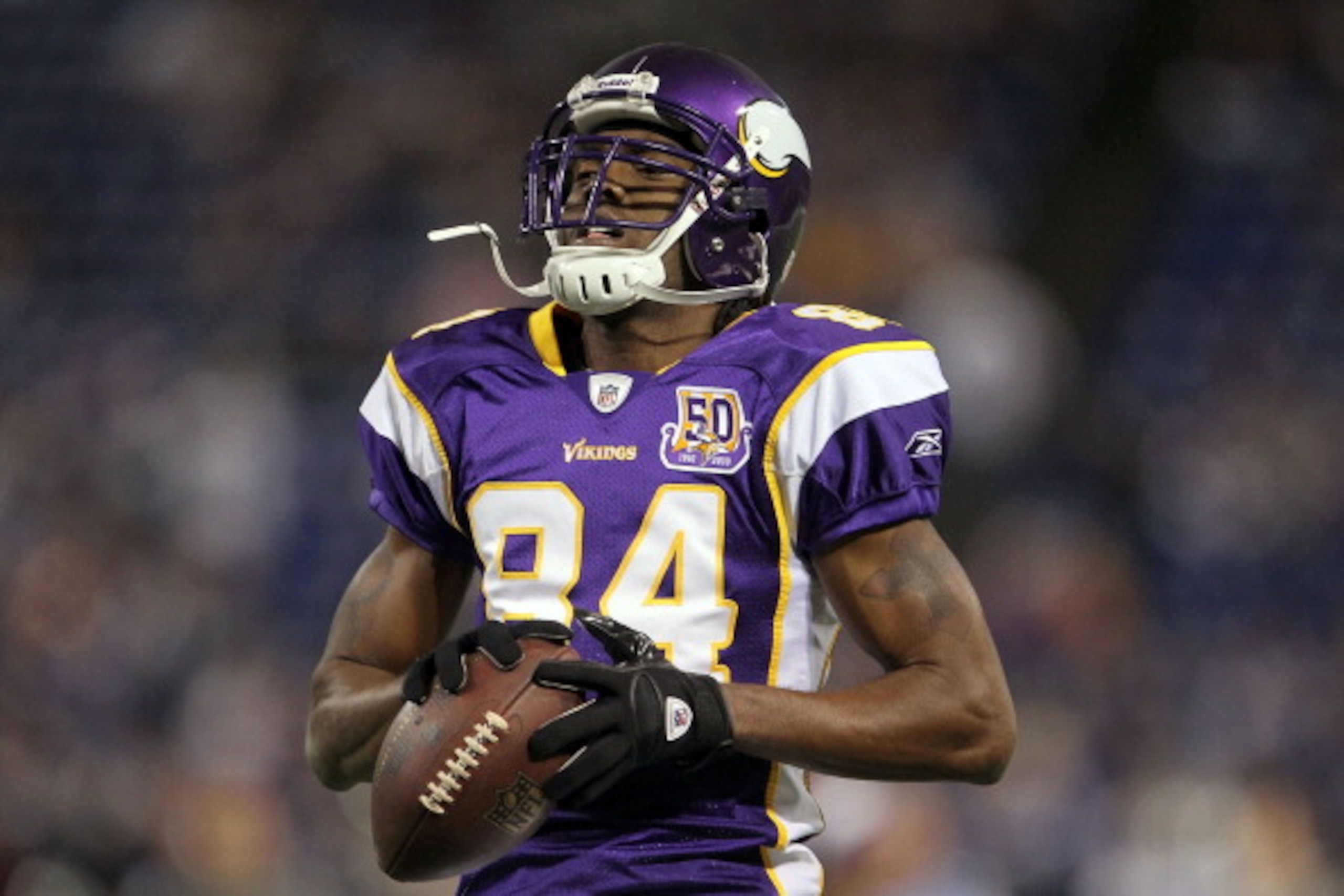 MINNEAPOLIS - OCTOBER 17:  Wide receiver Randy Moss #84 the Minnesota Vikings looks on prior to the start of the game against the Dallas Cowboys at Mall of America Field on October 17, 2010 in Minneapolis, Minnesota.  (Photo by Jeff Gross/Getty Images)
