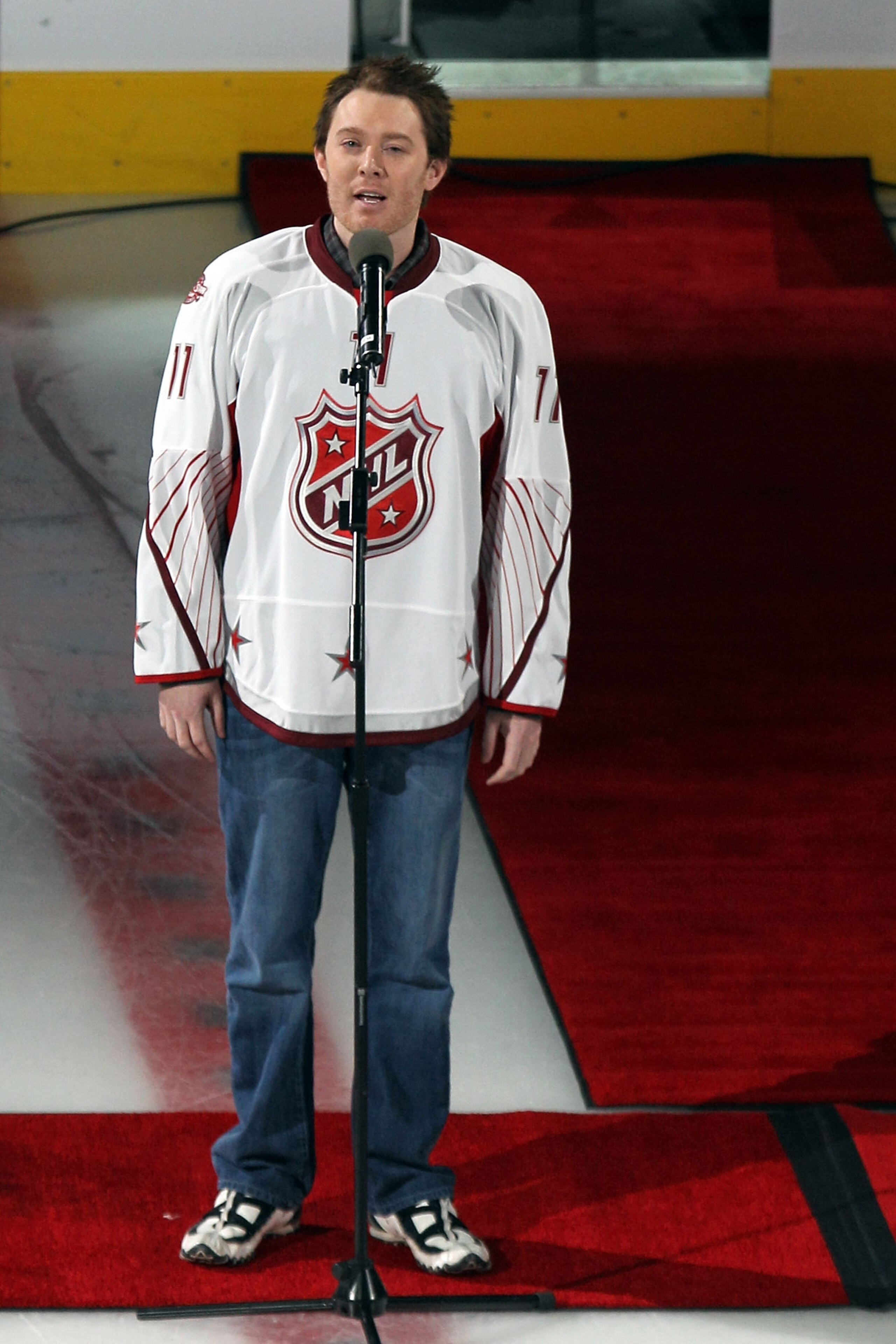 RALEIGH, NC - JANUARY 30:  Singer Clay Aiken sings the United States National Anthem before the 58th NHL All-Star Game at RBC Center on January 30, 2011 in Raleigh, North Carolina.  (Photo by Bruce Bennett/Getty Images)