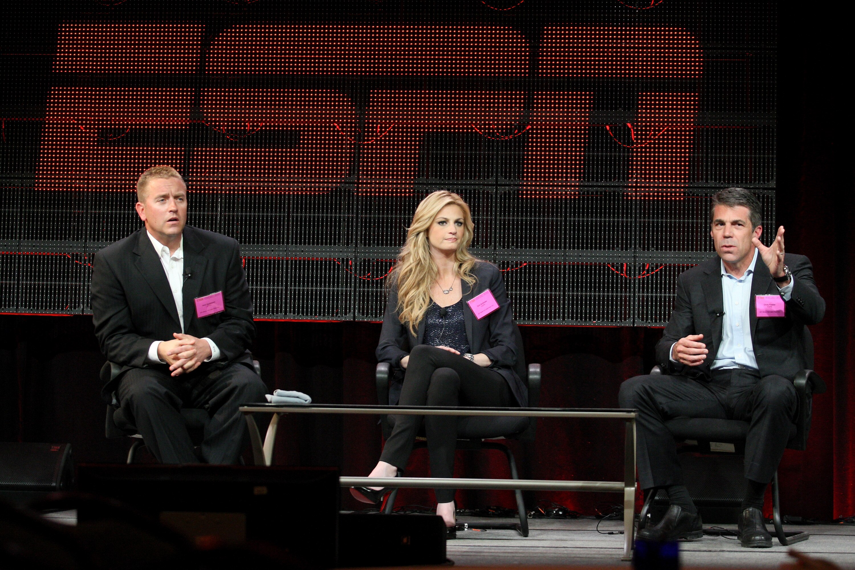 PASADENA, CA - JANUARY 05:  (L-R)Broadcasters Kirk Herbstreit, Erin Andrews and Chris Fowler speak onstage during the 'BCS Title Game' panel at the ESPN portion of the 2011 Winter TCA press tour held at the Langham Hotel on January 5, 2011 in Pasadena, Ca