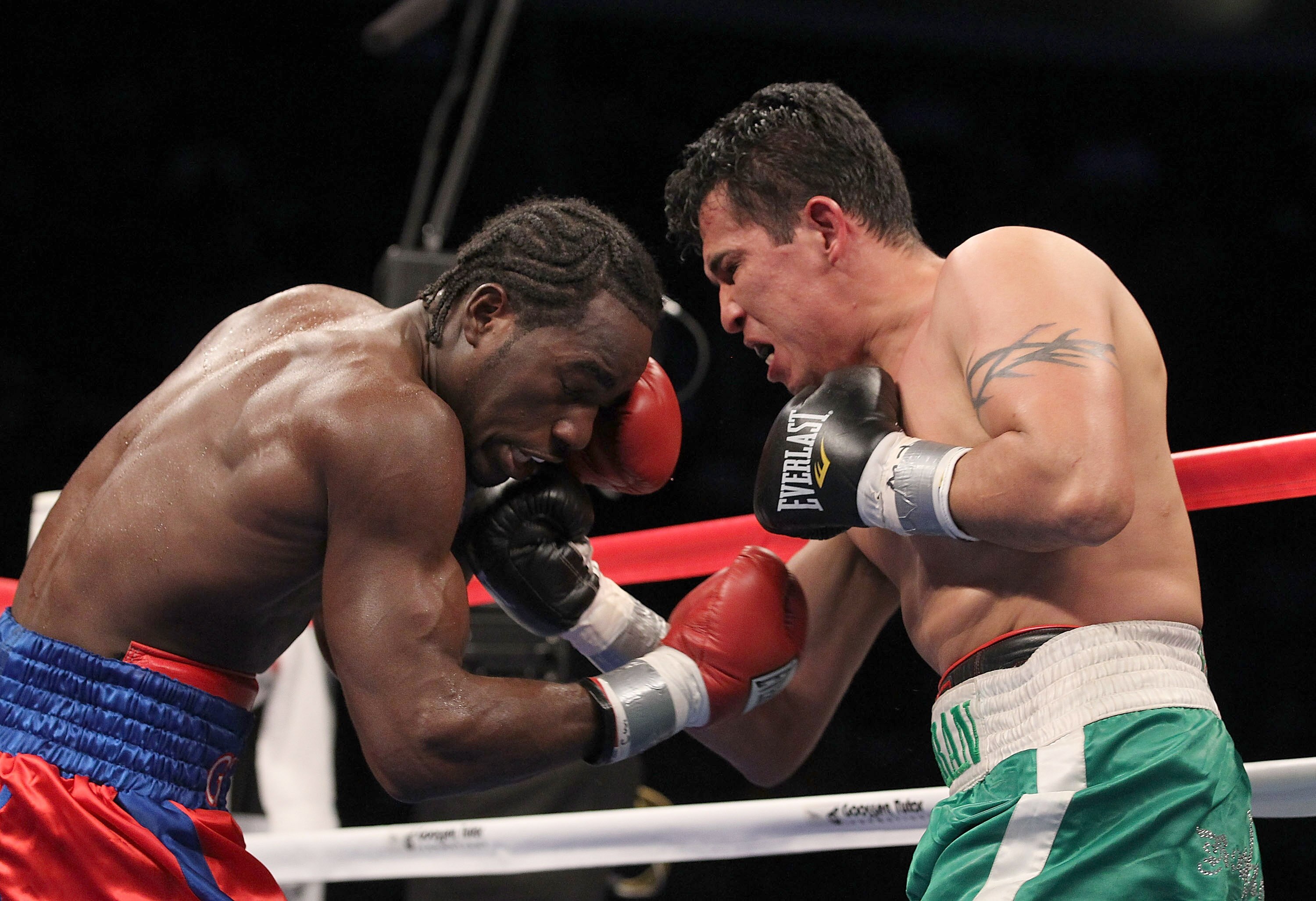 ATLANTIC CITY, NJ - NOVEMBER 20:  Saul Duran punches Fernando Guerrero during their middleweight fight on November 20, 2010 at The Boardwalk Hall in Atlantic City, New Jersey.  (Photo by Al Bello/Getty Images)