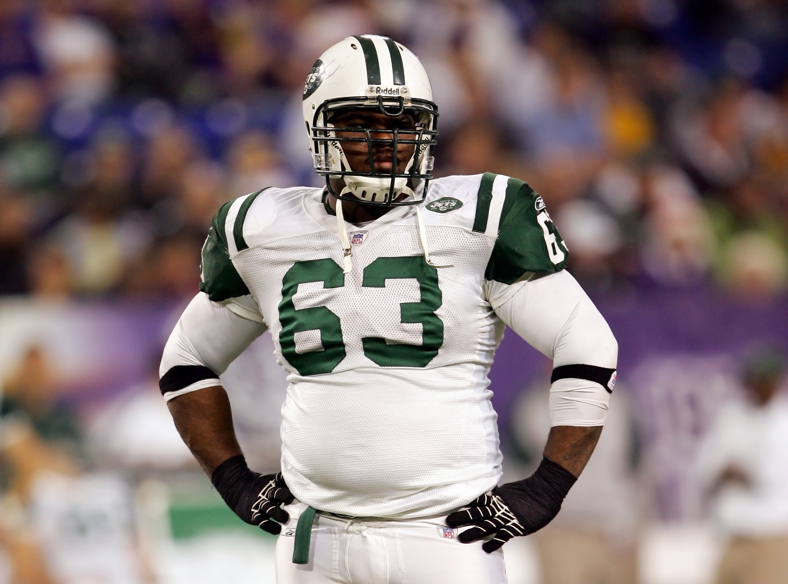 MINNEAPOLIS, MN - DECEMBER 17:   Dewayne Robertson #63 of the New York Jets looks on during the game against the Minnesota Vikings on December 17, 2006 at Hubert H. Humphrey Metrodome in Minneapolis, Minnesota.  (Photo by Lisa Blumenfeld/Getty Images)