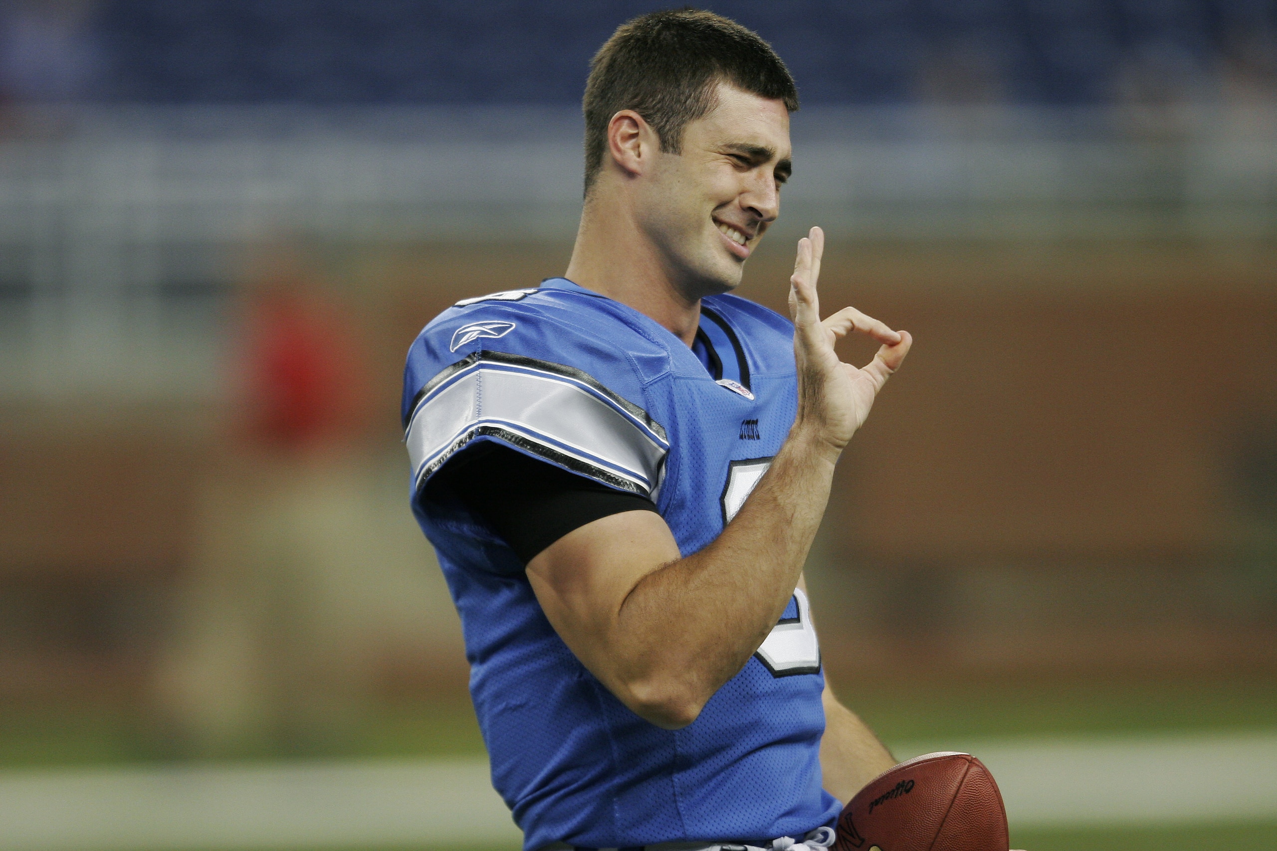 DETROIT - OCTOBER 9:  Joey Harrington #3 of the Detroit Lions jokes during warm-ups prior to the game against the Baltimore Ravens at Ford Field October 9, 2005 in Detroit, Michigan. The Lions won, 35-17.  (Photo by Tom Pidgeon/Getty Images)