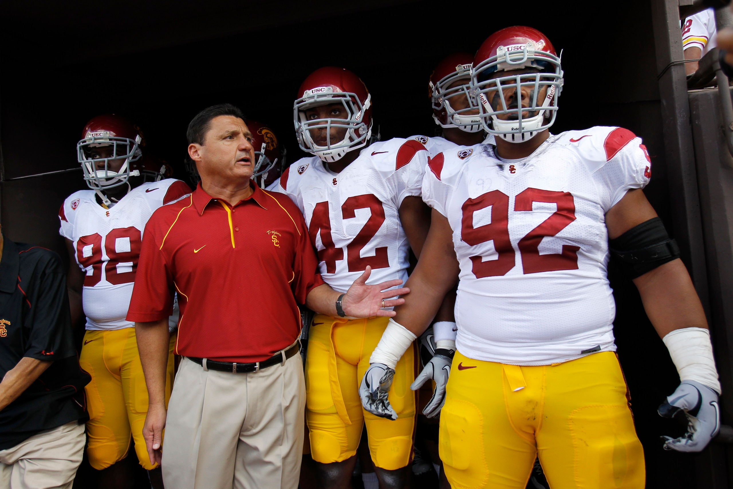HONOLULU - SEPTEMBER 02: Defensive and Recruiting Coordinator Ed Orgeron of the University of Souther California Trojans leads the team to the edge of the tunnel before the start of the Trojan's season opener against the Hawaii Warriors at Aloha Stadium HONOLULU - SEPTEMBER 02: Defensive and Recruiting Coordinator Ed Orgeron of the University of Souther California Trojans leads the team to the edge of the tunnel before the start of the Trojan's season opener against the Hawaii Warriors at Aloha Stadium