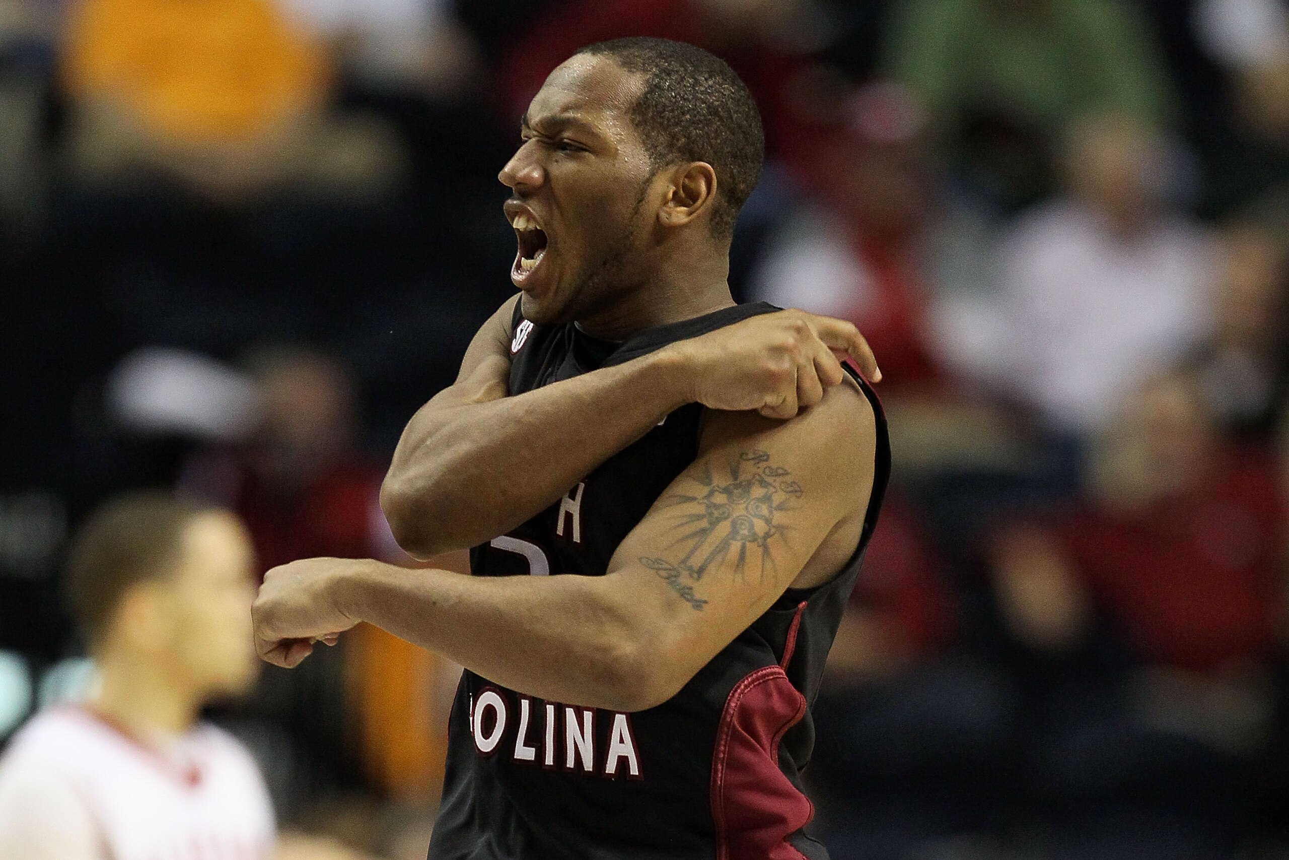 NASHVILLE, TN - MARCH 11:  Devan Downey #2 of the South Carolina Gamecocks reacts to an offensive play in the first half against the Alabama Crimson Tide during the first round of the SEC Men's Basketball Tournament at the Bridgestone Arena on March 11, 2