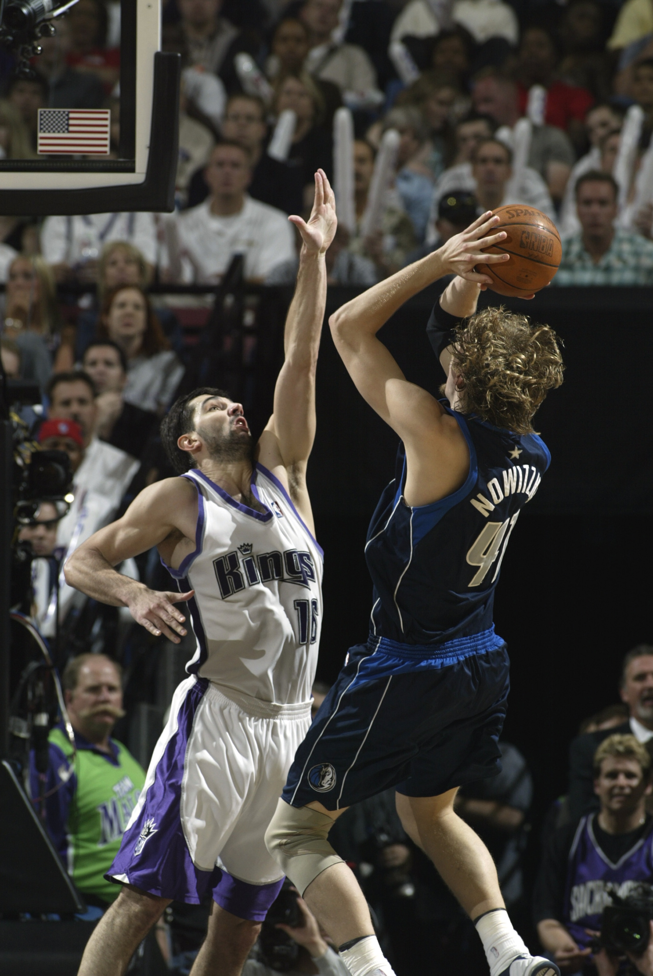 SACRAMENTO, CA - MAY 15: Dirk Nowitzki #41 of the Dallas Mavericks takes a fallaway jump shot over Predrag Stojakovic #16 of the Sacramento Kings in Game six of the Western Conference Semifinals during the 2003 NBA Playoffs at Arco Arena on May 15, 2003 SACRAMENTO, CA - MAY 15: Dirk Nowitzki #41 of the Dallas Mavericks takes a fallaway jump shot over Predrag Stojakovic #16 of the Sacramento Kings in Game six of the Western Conference Semifinals during the 2003 NBA Playoffs at Arco Arena on May 15, 2003