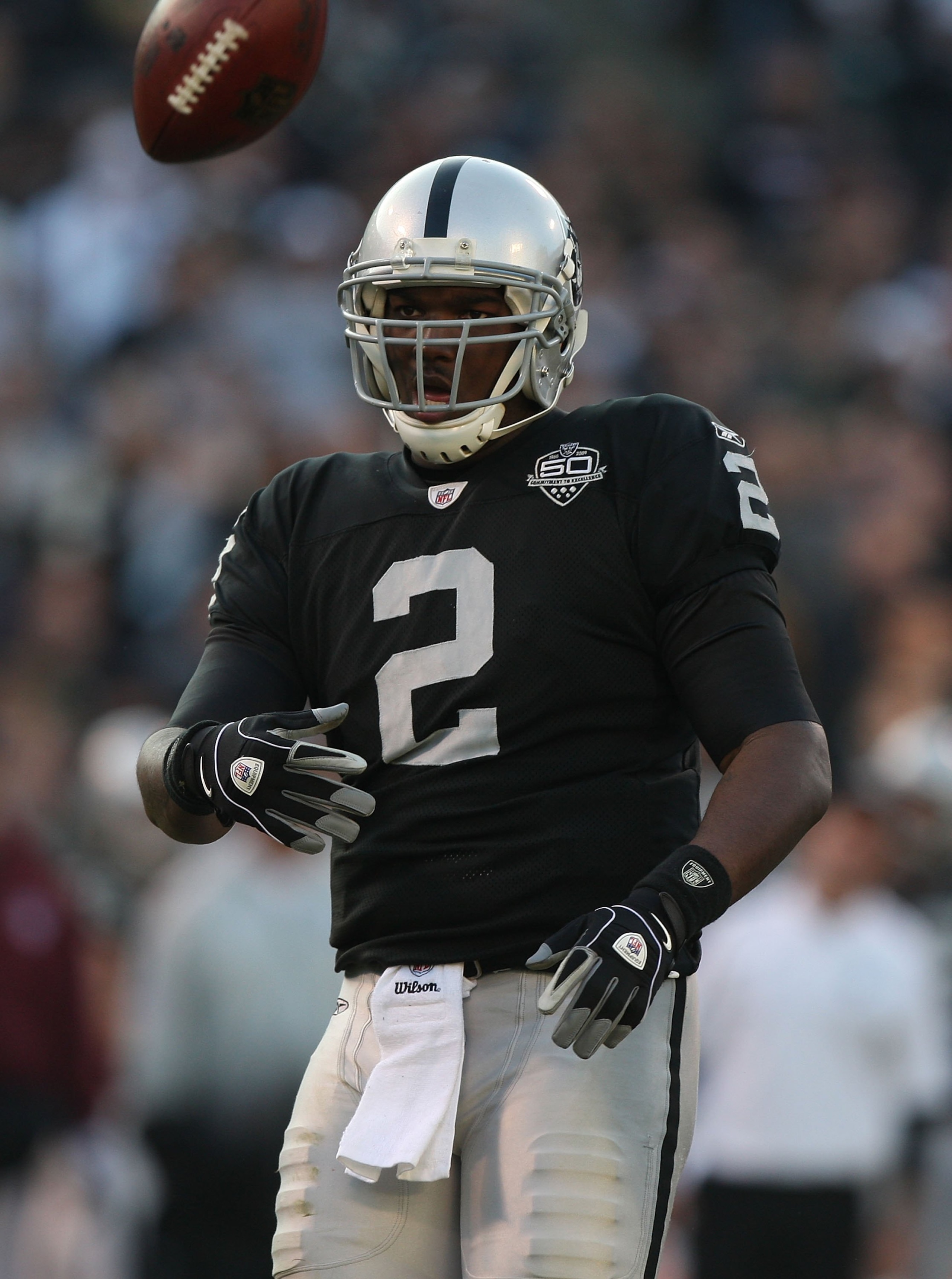 OAKLAND, CA - JANUARY 03:  JaMarcus Russell #2 of the Oakland Raiders in action  against the Baltimore Ravens during an NFL game at Oakland-Alameda County Coliseum on January 3, 2010 in Oakland, California.  (Photo by Jed Jacobsohn/Getty Images)