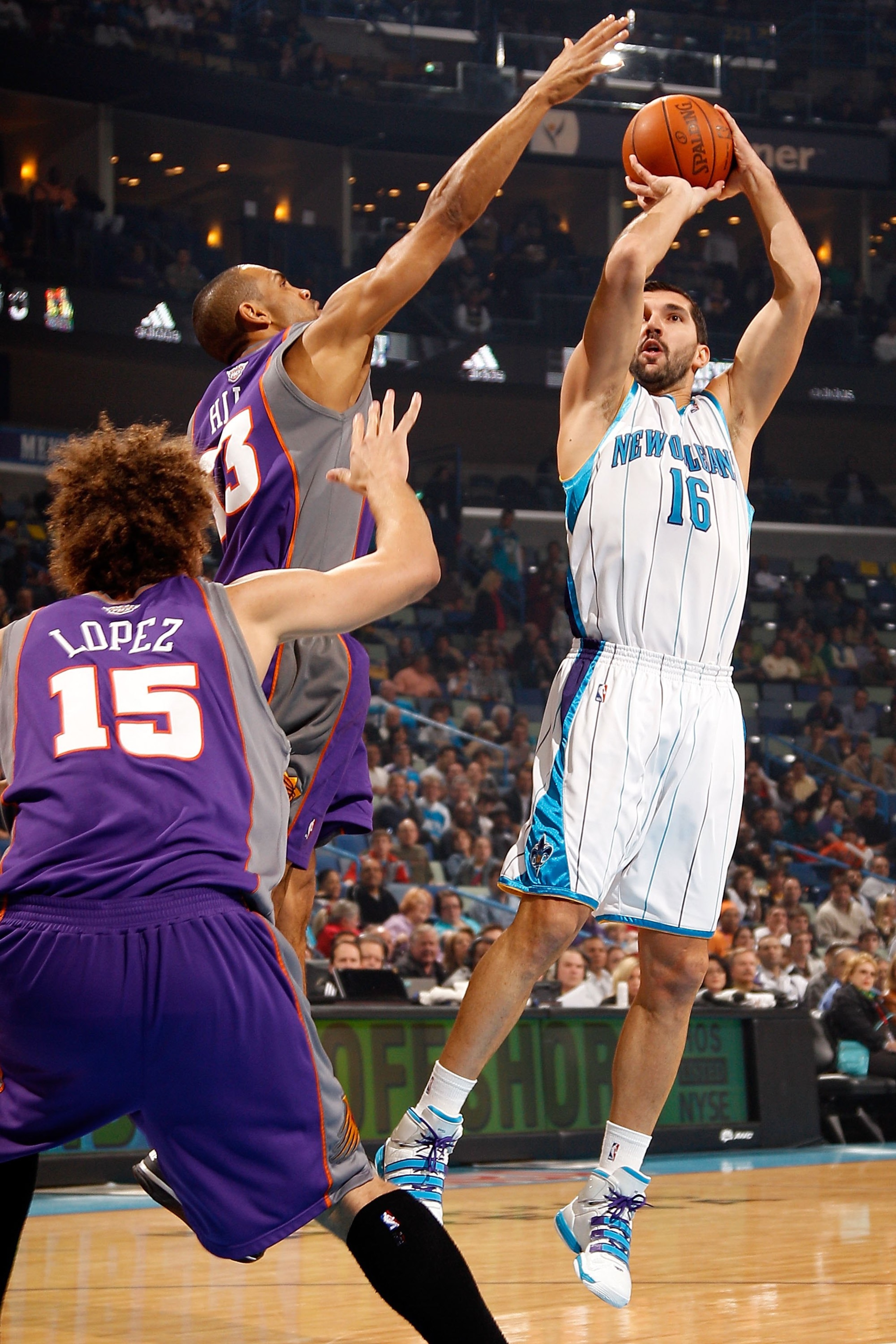 NEW ORLEANS - FEBRUARY 01: Peja Stojakovic #16 of the New Orleans Hornets shoots the ball over Grant Hill #33 of the Phoenix Suns at the New Orleans Arena on February 1, 2010 in New Orleans, Louisiana. NOTE TO USER: User expressly acknowledges and agree NEW ORLEANS - FEBRUARY 01: Peja Stojakovic #16 of the New Orleans Hornets shoots the ball over Grant Hill #33 of the Phoenix Suns at the New Orleans Arena on February 1, 2010 in New Orleans, Louisiana. NOTE TO USER: User expressly acknowledges and agree