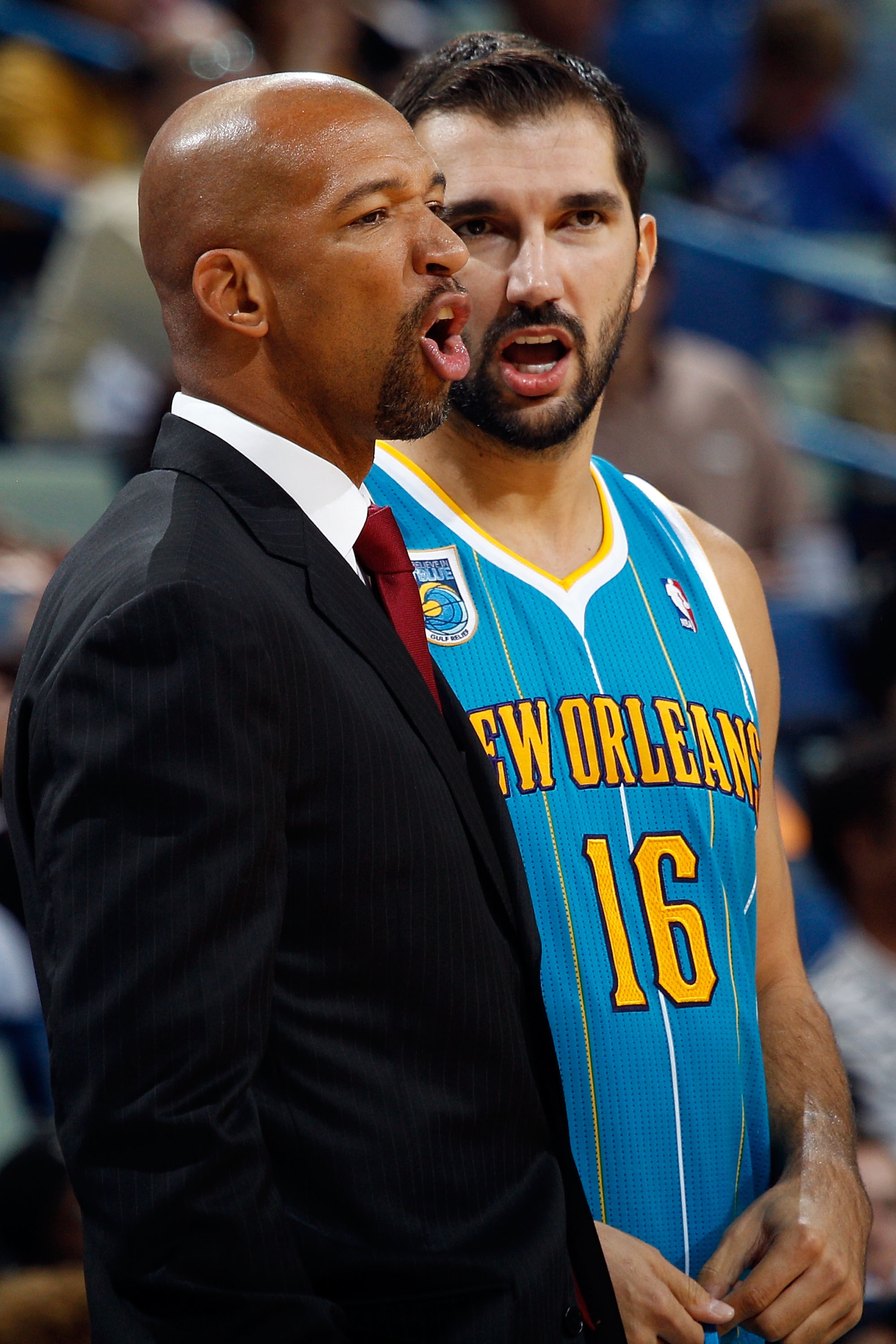 NEW ORLEANS - OCTOBER 13: Head coach Monty Williams and Peja Stojakovic #16 of the New Orleans Hornets in action during the game against the Miami Heat at the New Orleans Arena on October 13, 2010 in New Orleans, Louisiana. NOTE TO USER: User expressly NEW ORLEANS - OCTOBER 13: Head coach Monty Williams and Peja Stojakovic #16 of the New Orleans Hornets in action during the game against the Miami Heat at the New Orleans Arena on October 13, 2010 in New Orleans, Louisiana. NOTE TO USER: User expressly