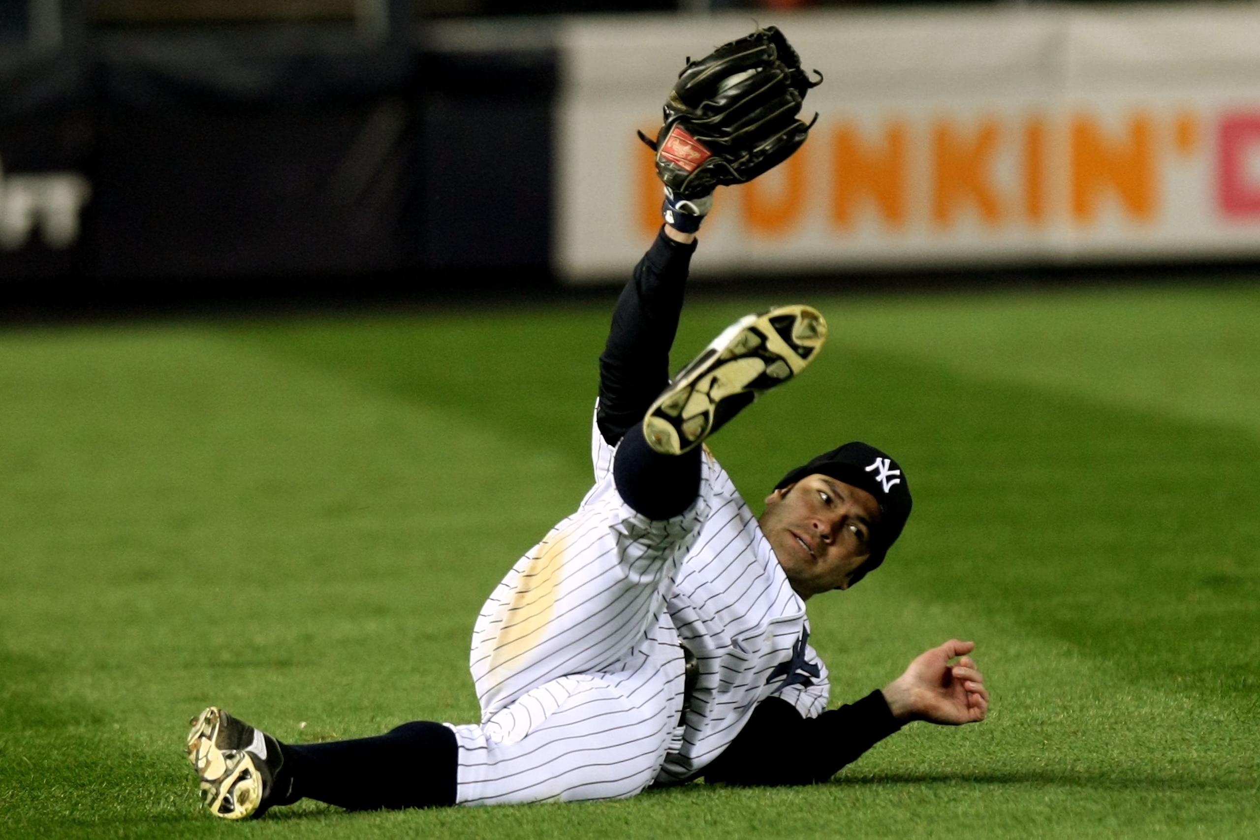 NEW YORK - OCTOBER 17: Johnny Damon #18 of the New York Yankees makes a catch in left field in the top of the ninth inning against the Los Angeles Angels of Anaheim in Game Two of the ALCS during the 2009 MLB Playoffs at Yankee Stadium on October 17, 200 NEW YORK - OCTOBER 17: Johnny Damon #18 of the New York Yankees makes a catch in left field in the top of the ninth inning against the Los Angeles Angels of Anaheim in Game Two of the ALCS during the 2009 MLB Playoffs at Yankee Stadium on October 17, 200
