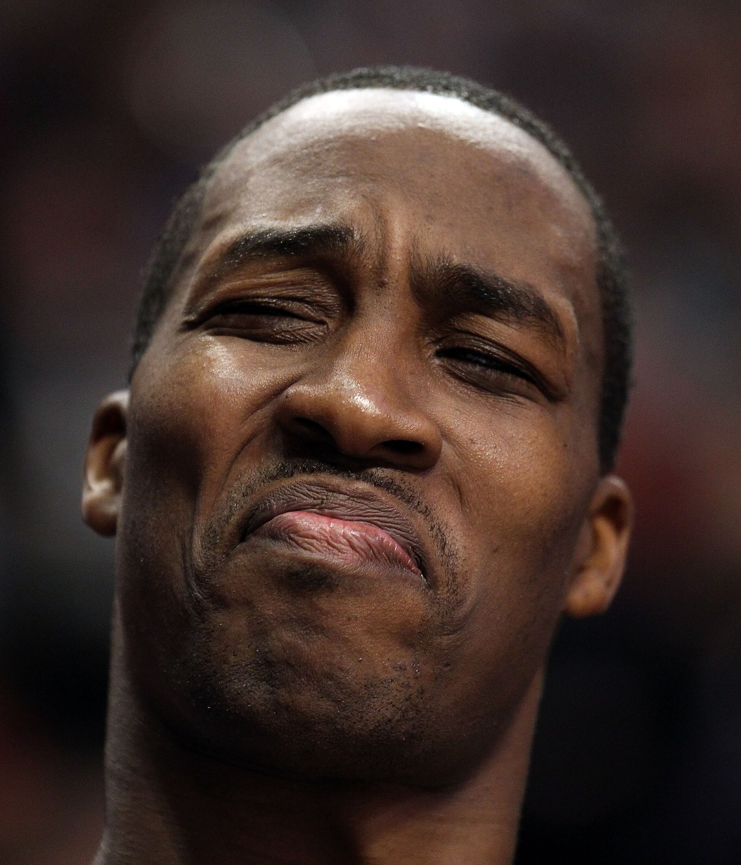 CHICAGO, IL - JANUARY 28: Dwight Howard #12 of the Orlando Magic reacts to the taunts of a fan as he sits on the bench during a game against the Chicago Bulls at the United Center on January 28, 2011 in Chicago, Illinois. NOTE TO USER: User expressly ackn