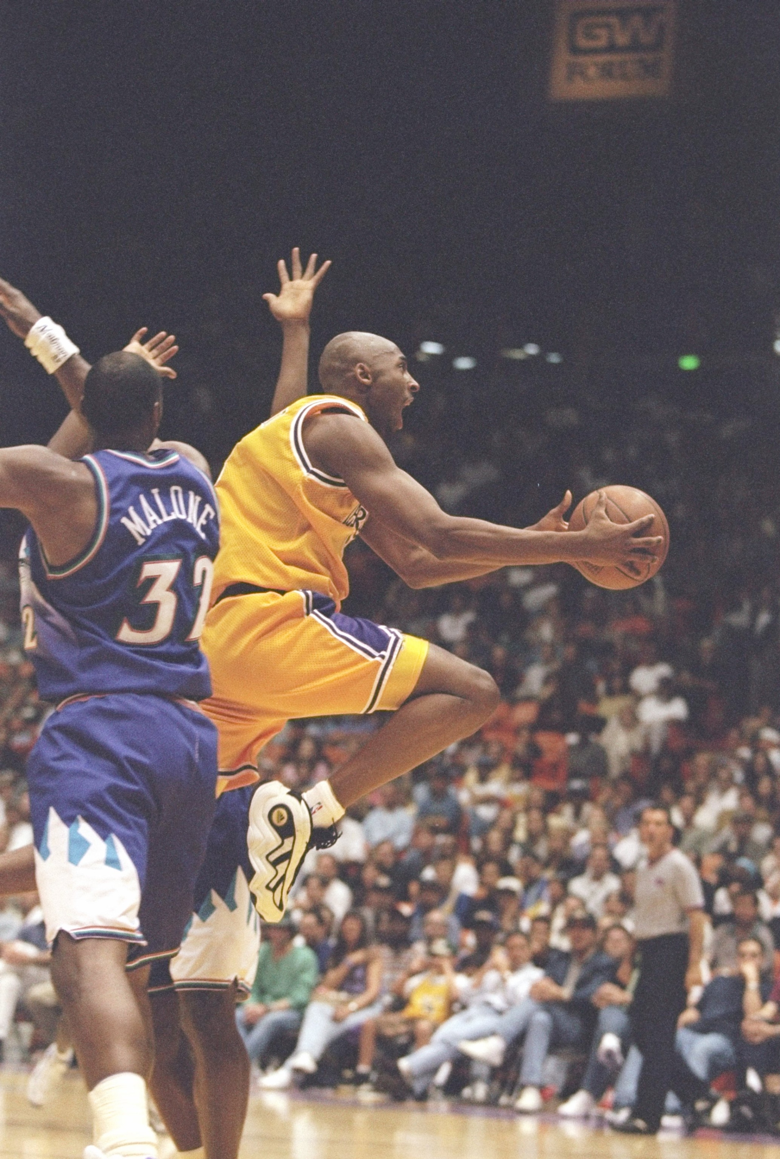 10 May 1997:  Guard Kobe Bryant of the Los Angeles Lakers jumps for the ball during a playoff game against the Utah Jazz at the Great Western Forum in Inglewood, California.  The Jazz won the game 110-95. Mandatory Credit: Todd Warshaw  /Allsport