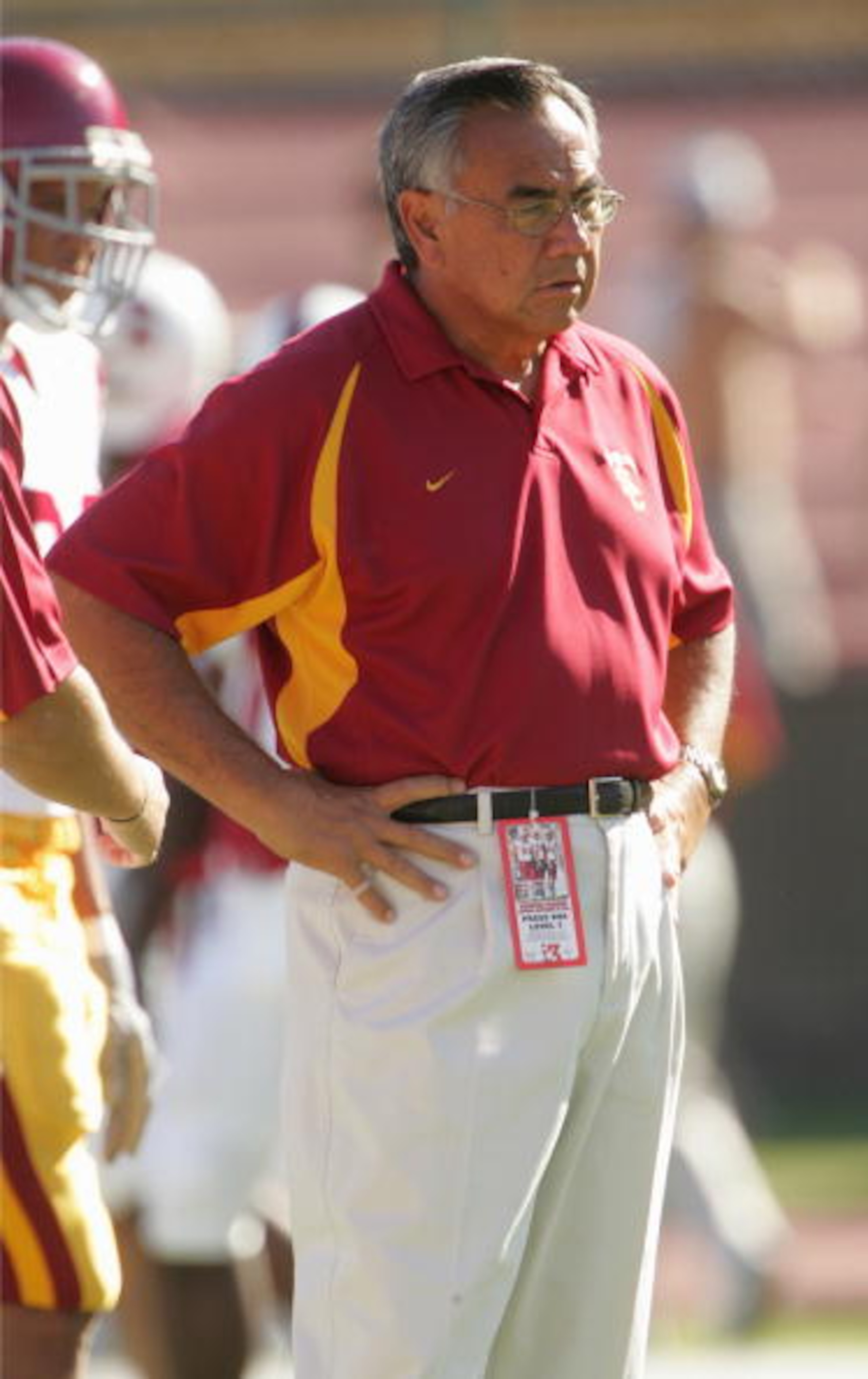 PALO ALTO, CA - SEPTEMBER 25: Offensive coordinator Norm Chow of the USC Trojans watches the action on the field during the game against the Stanford Cardinal on September 25, 2004 at Stanford Stadium in Palo Alto, California. USC defeated Stanford 31-2 PALO ALTO, CA - SEPTEMBER 25: Offensive coordinator Norm Chow of the USC Trojans watches the action on the field during the game against the Stanford Cardinal on September 25, 2004 at Stanford Stadium in Palo Alto, California. USC defeated Stanford 31-2