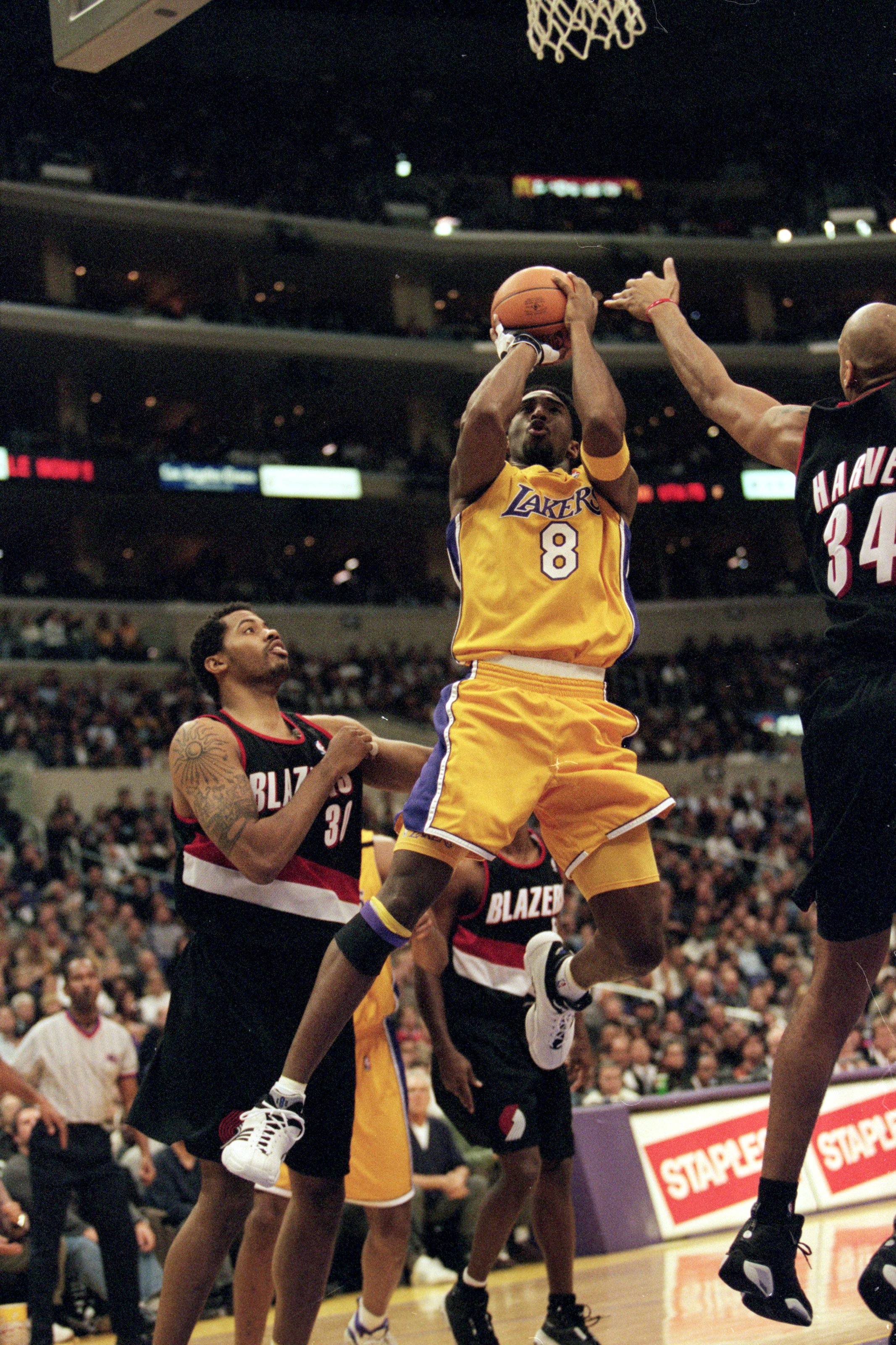 3 Dec 1999: Kobe Bryant #8 of the Los Angeles Lakers makes a jump shot during the game against the Portland TrailBlazers at the Staples Center in Los Angeles, California. The Lakers defeated the Blazers 93-80.  Mandatory Credit: Tom Hauck  /Allsport
