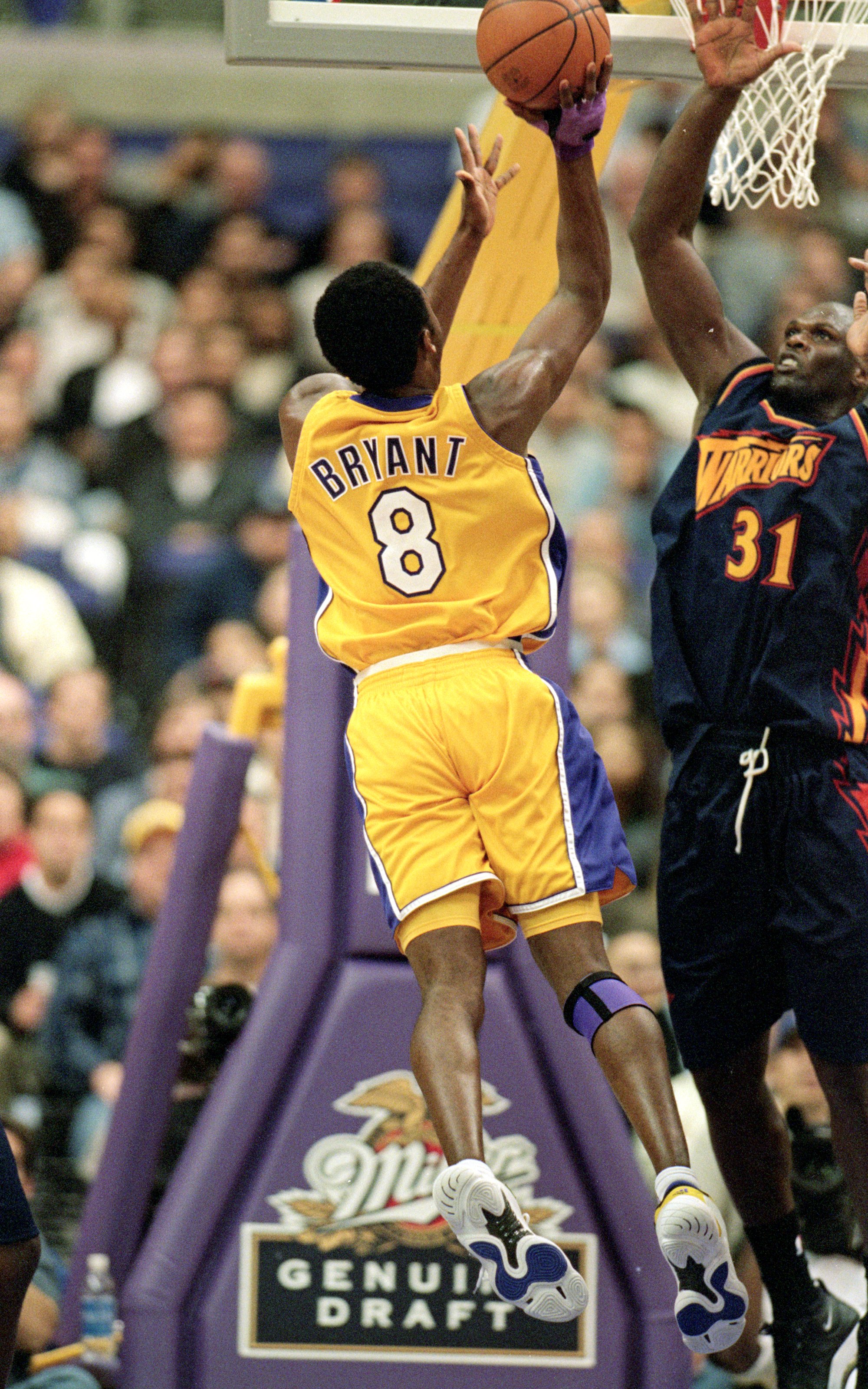 1 Dec 1999:  Kobe Bryant #8 of the Los Angeles Lakers makes a layup during a game against the Golden State Warriors at the Staples Center in Los Angeles, California. The Lakers defeated the Warriors 93-75.  Mandatory Credit: Tom Hauck  /Allsport