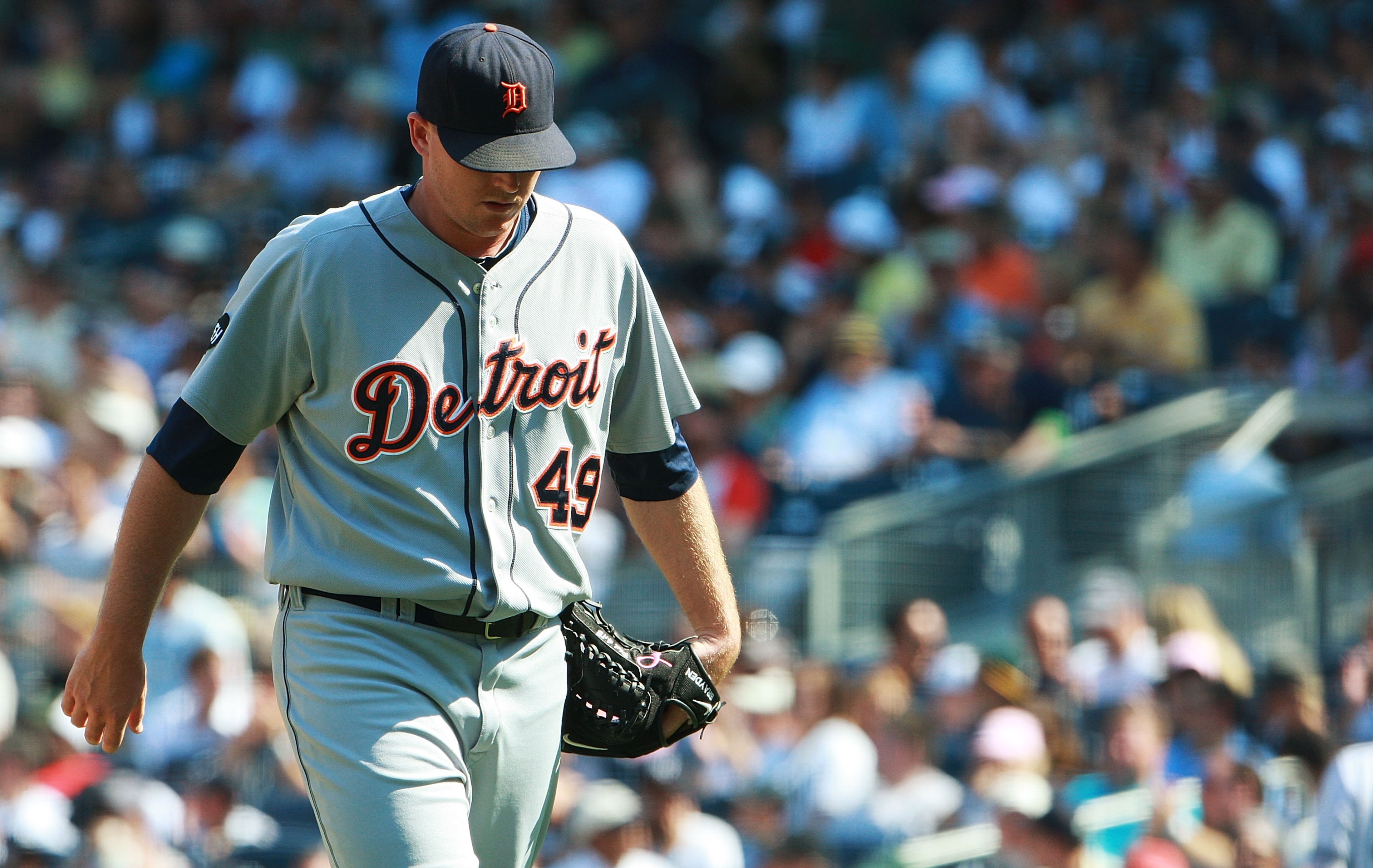 NEW YORK - AUGUST 19:  Eddie Bonine #49 of the Detroit Tigers walks off the mound at the end of the sixth inning after allowing two runs against the New York Yankees at Yankee Stadium on August 19, 2010 in the Bronx borough of New York City. The Yankees h