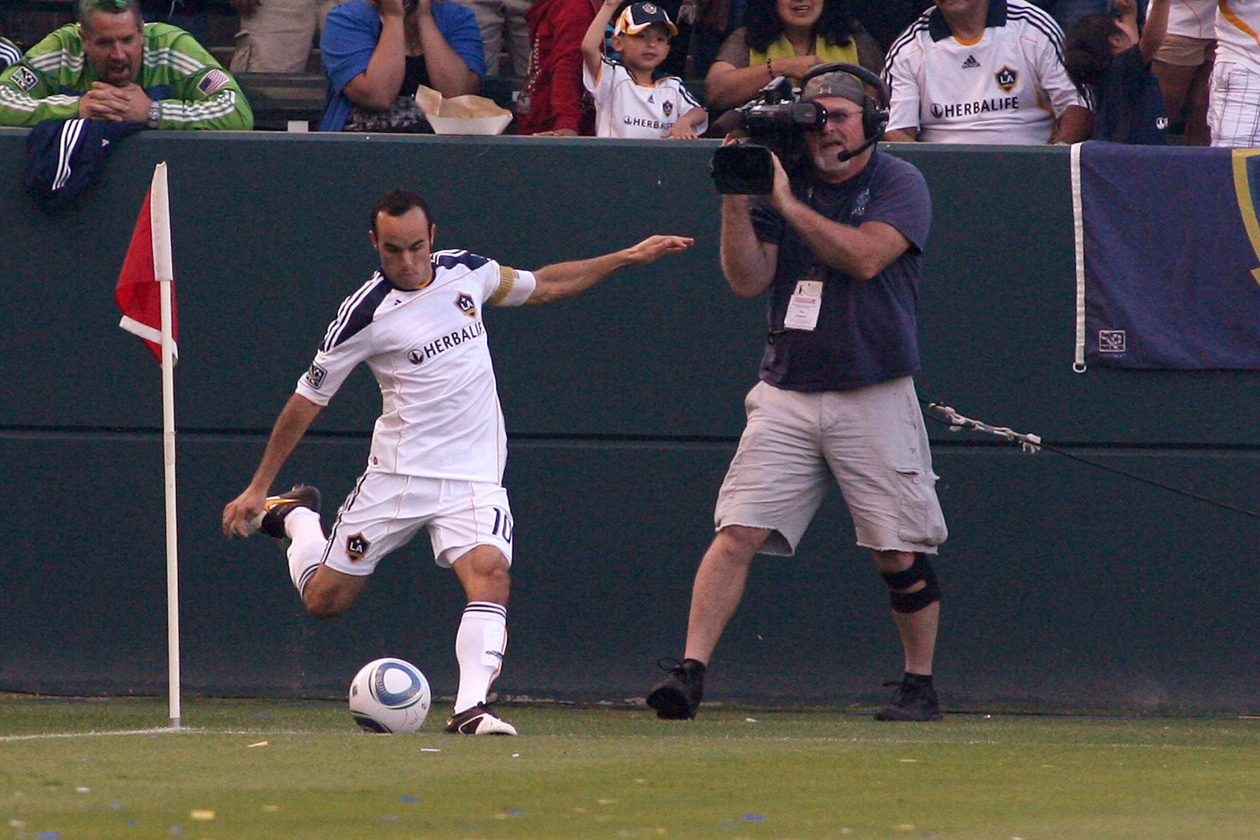 CARSON, CA - JULY 04:  Landon Donovan #10 of the Los Angeles Galaxy takes a corner kick against the Seattle Sounders FC on July 4, 2010 at the Home Depot Center in Carson, California.  Donovan is playing in his first MLS game since returning from the 2010