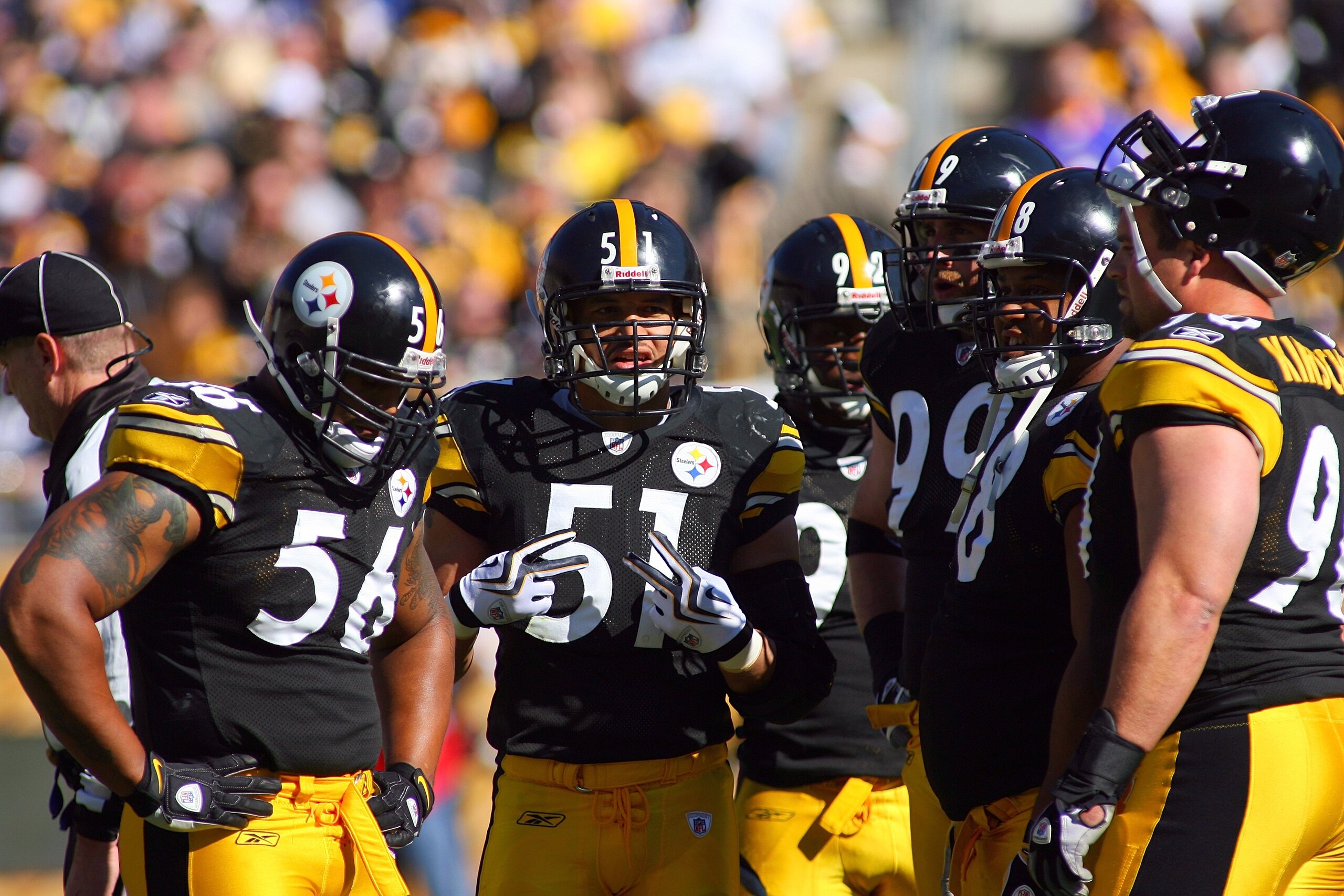 PITTSBURGH - OCTOBER 25:  James Farrior #51 of the Pittsburgh Steelers looks on with his defensive teammates from the huddle during the NFL game against the Minnesota Vikings at Heinz Field on October 25, 2009 in Pittsburgh, Pennsylvania. The Steelers def