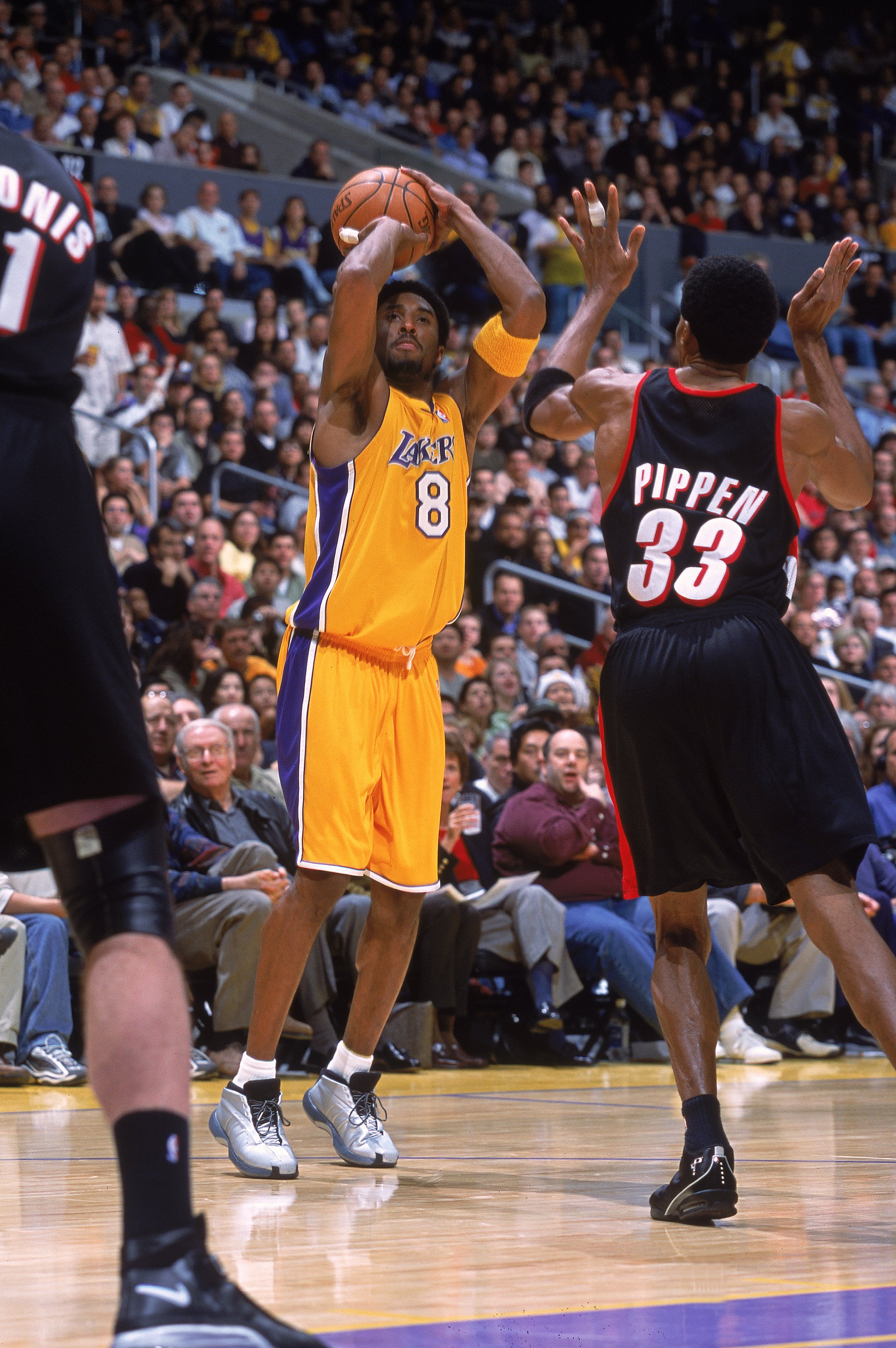 25 Dec 2000:  Kobe Bryant #8 of the Los Angeles Lakers takes a shot against Scottie Pippen #33 of the Portland Trail Blazers during the game at the STAPLES Center in Los Angeles, California. The Trail Blazers defeated the Lakers 109-104.   NOTE TO USER: I