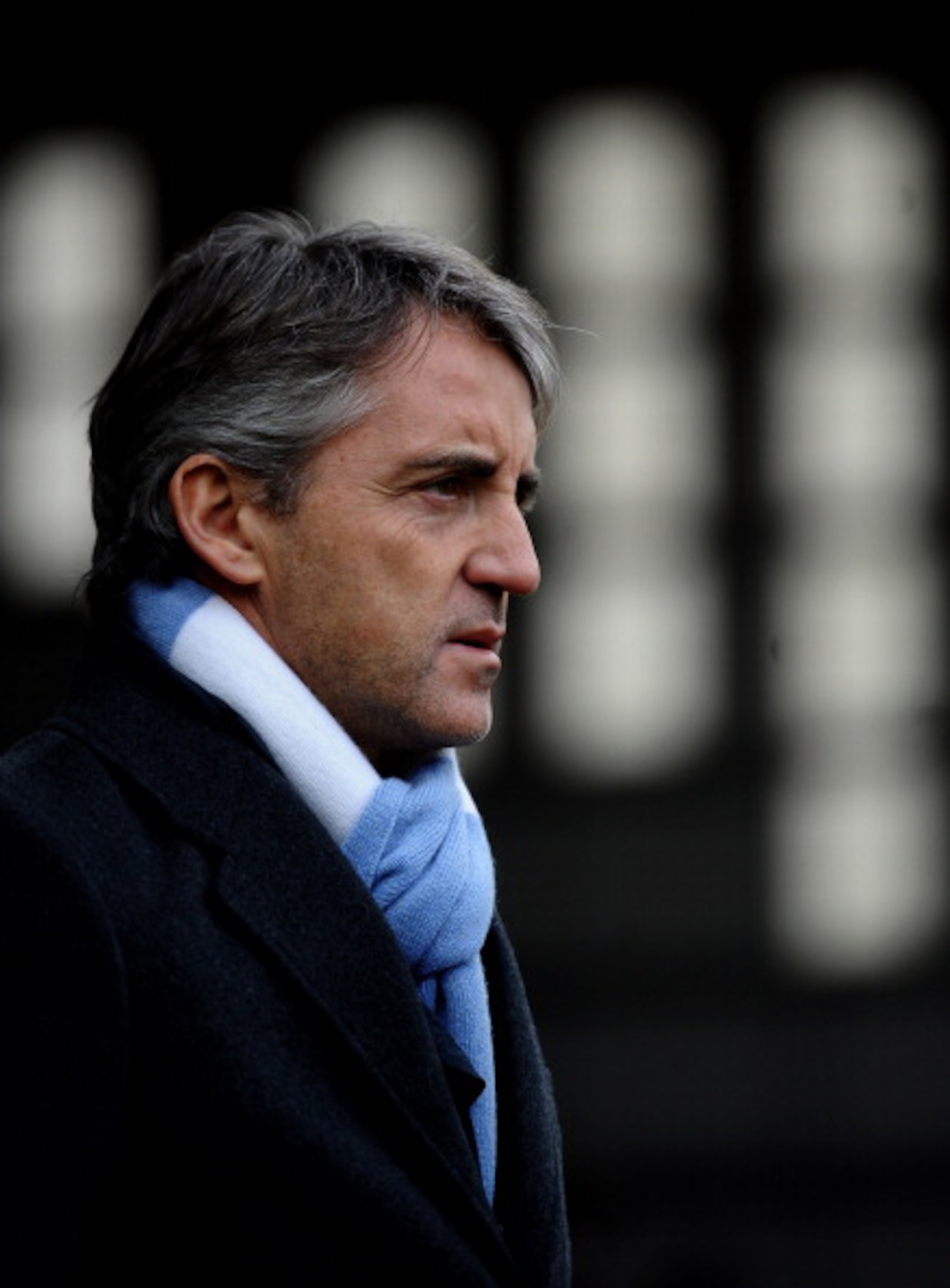 NOTTINGHAM, ENGLAND - JANUARY 30: Manchester City Manager Roberto Mancini looks on prior to the FA Cup sponsored by E.On 4th Round match between Notts County and Manchester City at Meadow Lane on January 30, 2011 in Nottingham, England. (Photo by Lauren NOTTINGHAM, ENGLAND - JANUARY 30: Manchester City Manager Roberto Mancini looks on prior to the FA Cup sponsored by E.On 4th Round match between Notts County and Manchester City at Meadow Lane on January 30, 2011 in Nottingham, England. (Photo by Lauren
