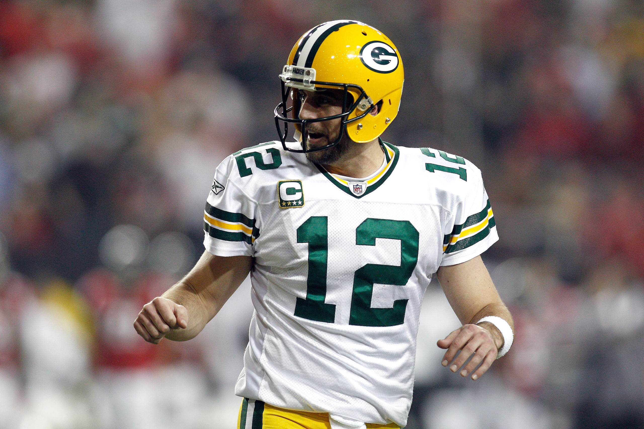 ATLANTA, GA - JANUARY 15:  Quarterback Aaron Rodgers #12 of the Green Bay Packers reacts against the Atlanta Falcons during their 2011 NFC divisional playoff game at Georgia Dome on January 15, 2011 in Atlanta, Georgia.  (Photo by Chris Graythen/Getty Ima