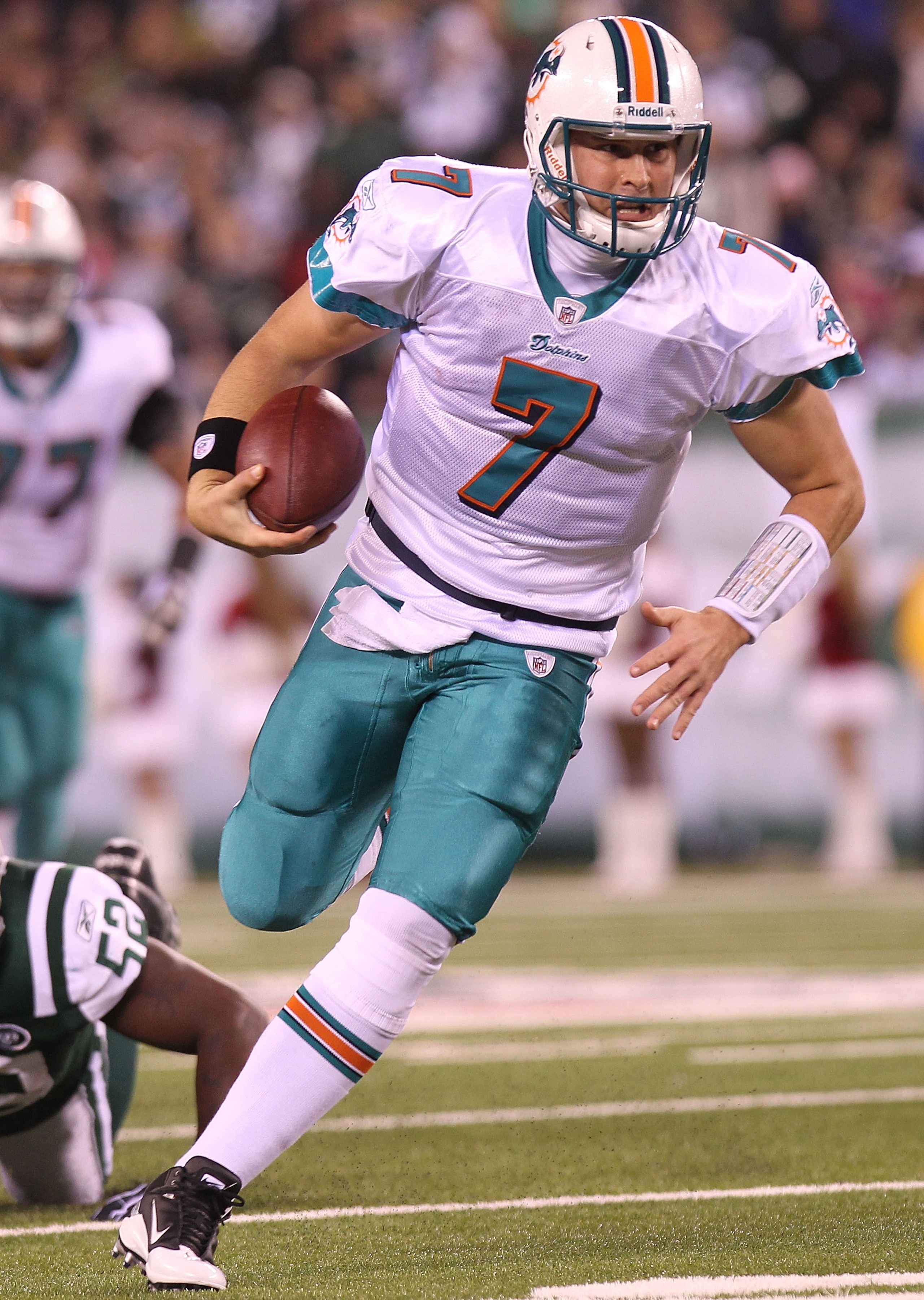 EAST RUTHERFORD, NJ - DECEMBER 12:  Chad Henne #7 of the Miami Dolphins scrambles from the pocket against the New York Jets at New Meadowlands Stadium on December 12, 2010 in East Rutherford, New Jersey.  (Photo by Nick Laham/Getty Images)