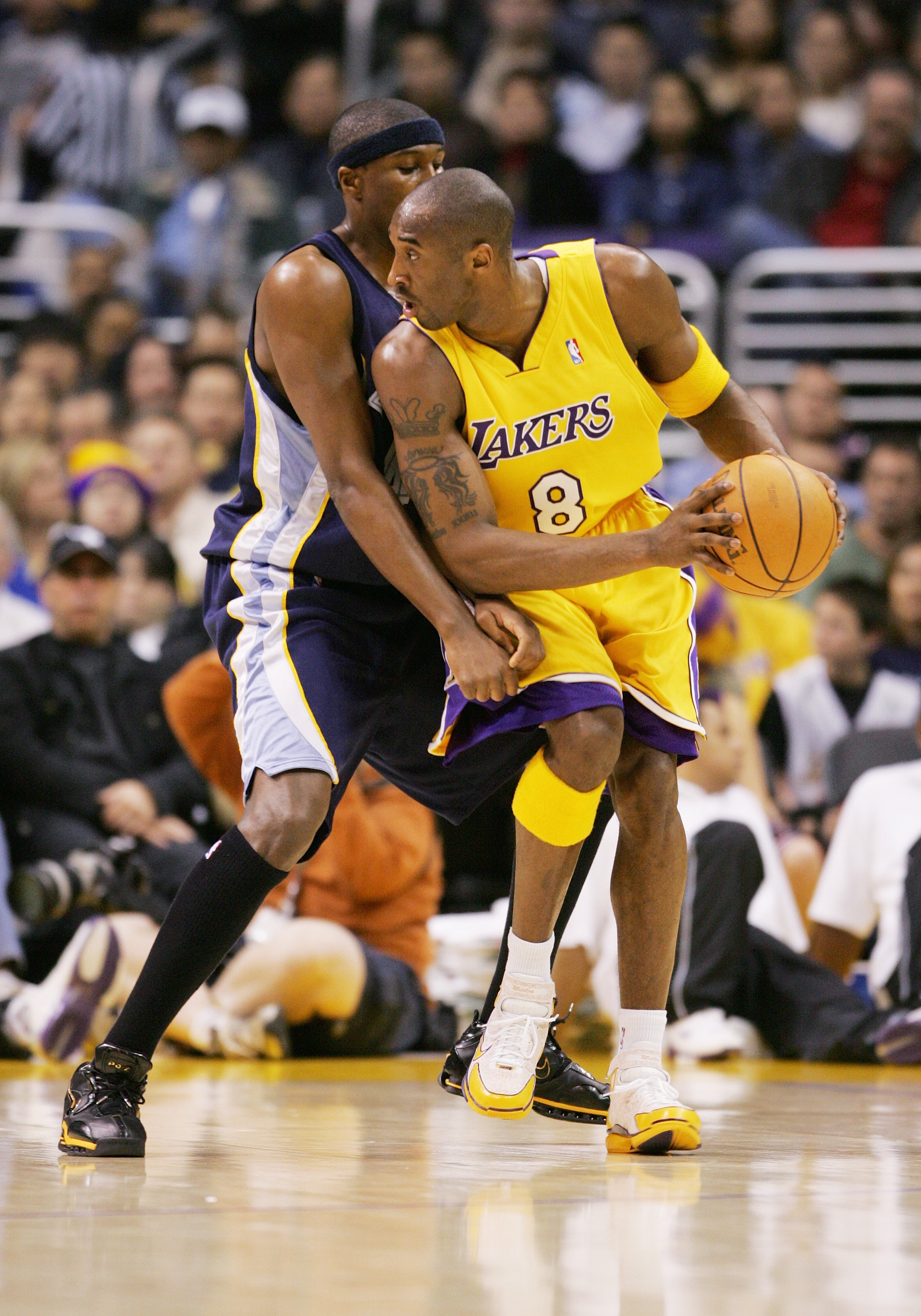 LOS ANGELES - DECEMBER 20:  Kobe Bryant #8 of the Los Angeles Lakers looks on against the Memphis Grizzlies at Staples Center on December 20, 2004 in Los Angeles, California. The Grizzlies won 82-72.  NOTE TO USER: User expressly acknowledges and agrees t