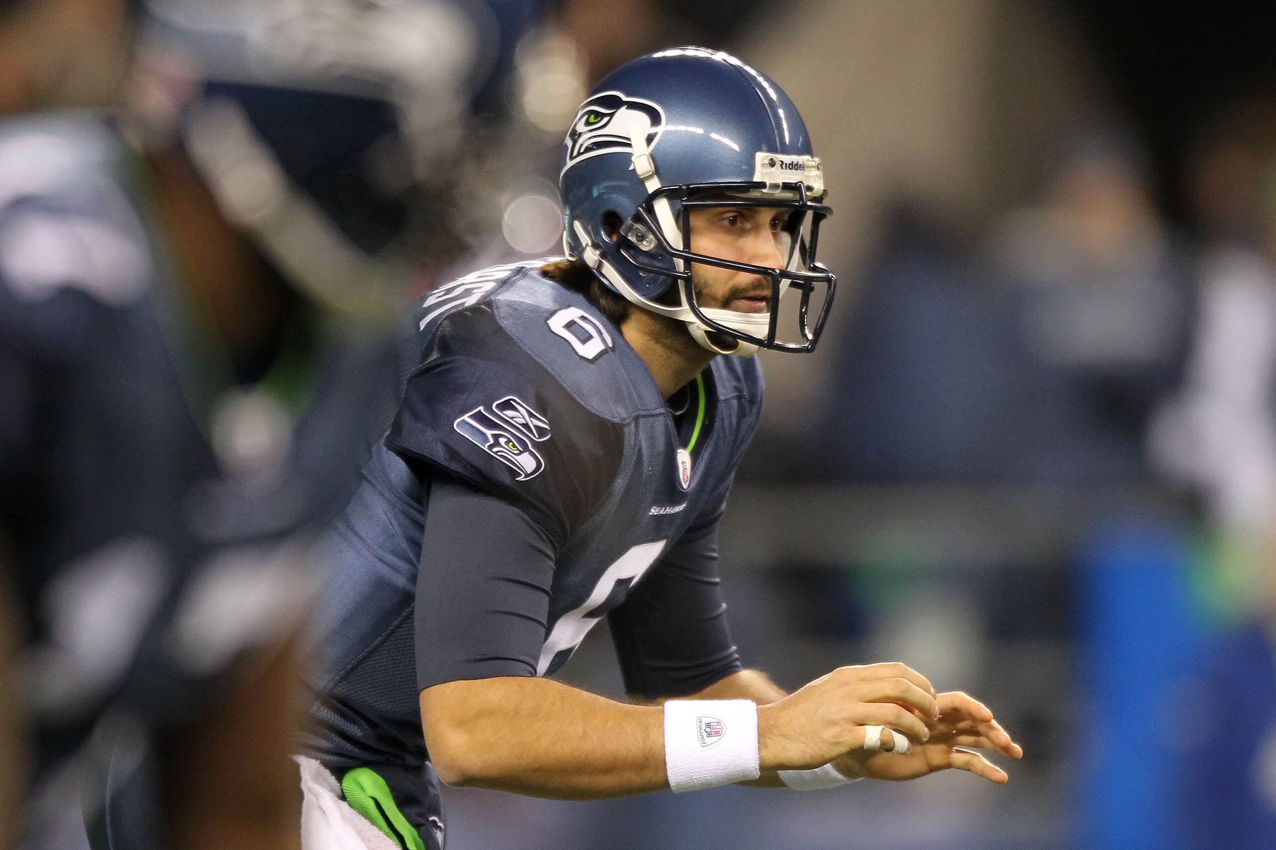 SEATTLE, WA - JANUARY 02:  Quarterback Charlie Whitehurst #6 of the Seattle Seahawks waits for the snap during their game against the St. Louis Rams at Qwest Field on January 2, 2011 in Seattle, Washington.  (Photo by Otto Greule Jr/Getty Images)