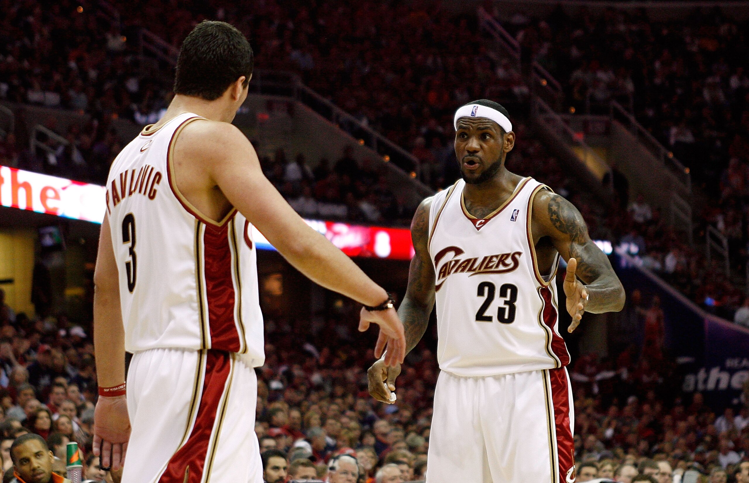 CLEVELAND - MAY 12:  LeBron James #23 and Sasha Pavlovic #3 of the Cleveland Cavaliers talk on court during a stop in play against the Boston Celtics in Game Four of the 2008 NBA Eastern Conference Semifinals on May 12, 2008 at the Quicken Loans Arena in