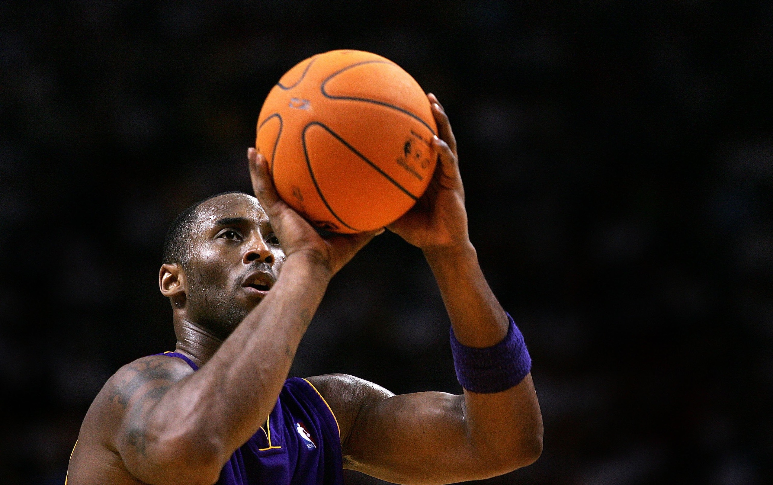 MIAMI - DECEMBER 25:  Guard Kobe Bryant #24 of the Los Angeles Lakers shoots free throws against the Miami Heat on December 25, 2006 at the American Airlines Arena in Miami, Florida. The Heat defeated the Lakers 101-85.  NOTE TO USER: User expressly ackno