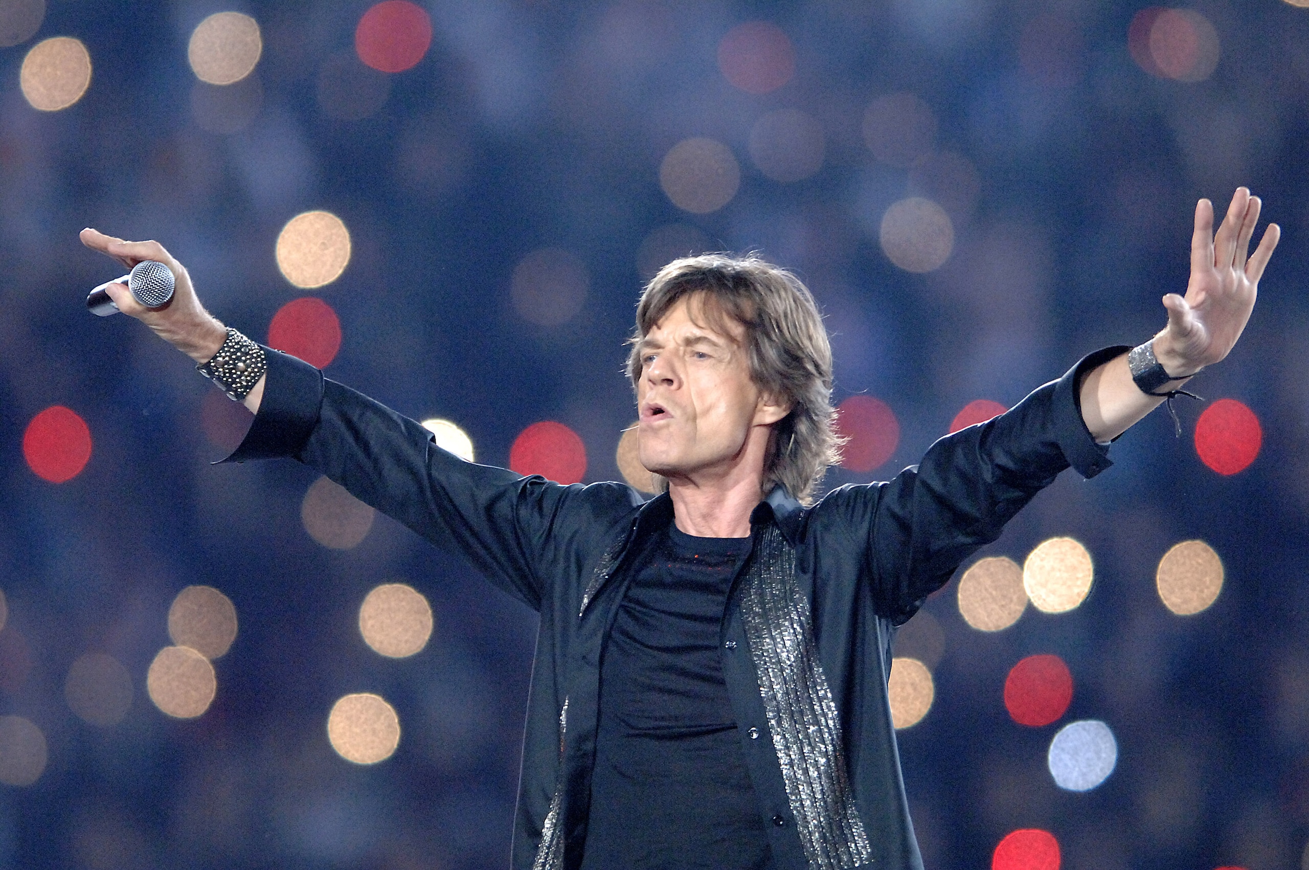 Mick Jagger of the Rolling Stones performs at halftime during Super Bowl XL between the Pittsburgh Steelers and Seattle Seahawks at Ford Field in Detroit, Michigan on February 5, 2006. (Photo by A. Messerschmidt/Getty Images)