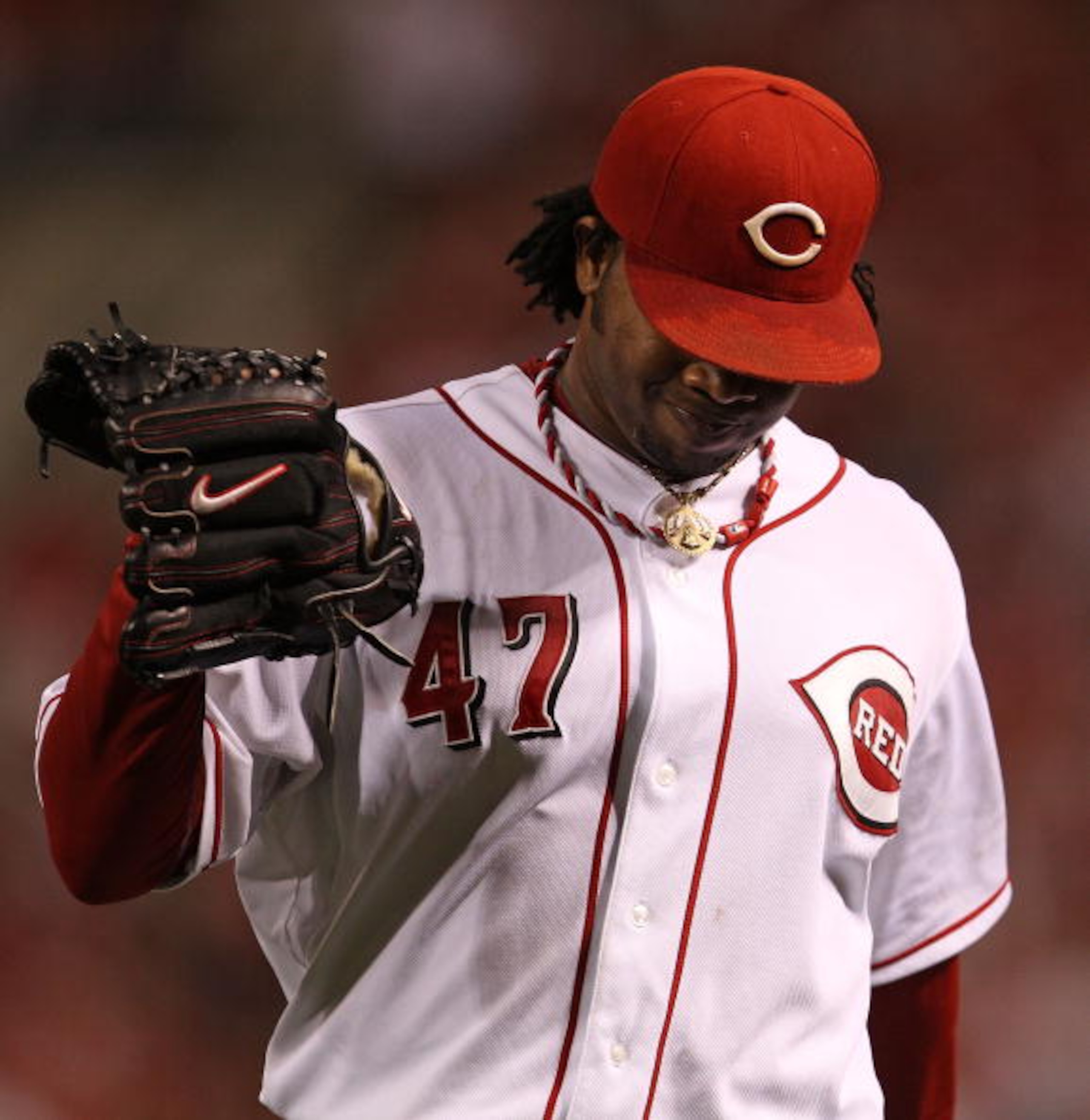 CINCINNATI - OCTOBER 10: Starting pitcher Johnny Cueto #47 of the Cincinnati Reds walks back to the dugout after the 5th inning against the Philadelphia Phillies during game 3 of the NLDS at Great American Ball Park on October 10, 2010 in Cincinnati, Ohio CINCINNATI - OCTOBER 10: Starting pitcher Johnny Cueto #47 of the Cincinnati Reds walks back to the dugout after the 5th inning against the Philadelphia Phillies during game 3 of the NLDS at Great American Ball Park on October 10, 2010 in Cincinnati, Ohio