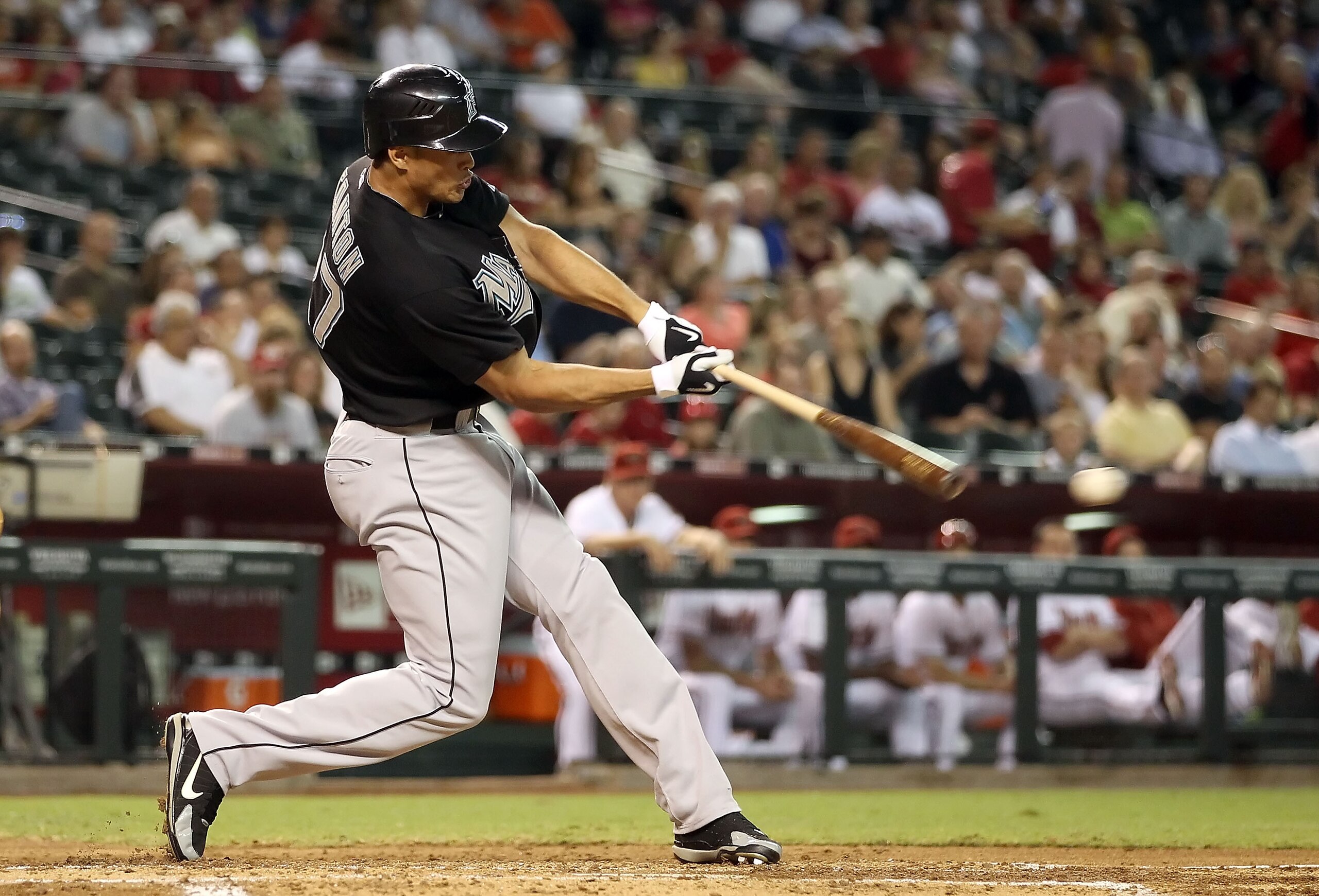 PHOENIX - JULY 08:  Mike Stanton #27 of the Florida Marlins hits a double against the Arizona Diamondbacks during the third inning of the Major League Baseball game at Chase Field on July 8, 2010 in Phoenix, Arizona.  (Photo by Christian Petersen/Getty Im
