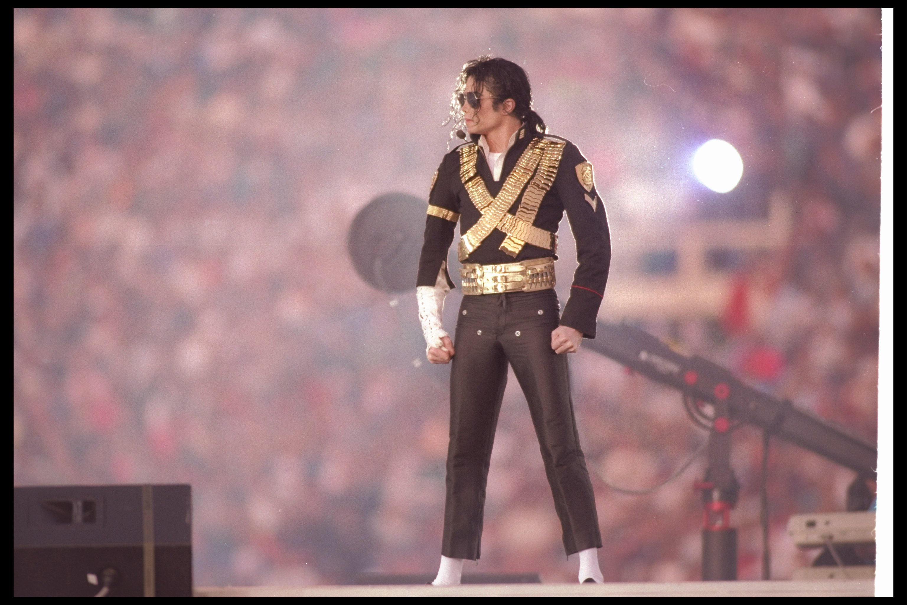 31 Jan 1993:  Singer Michael Jackson performs during halftime at Super Bowl XXVII between the Dallas Cowboys and the Buffalo Bills at the Rose Bowl in Pasadena, California.  The Cowboys won the game, 52-17. Mandatory Credit: Mike Powell  /Allsport