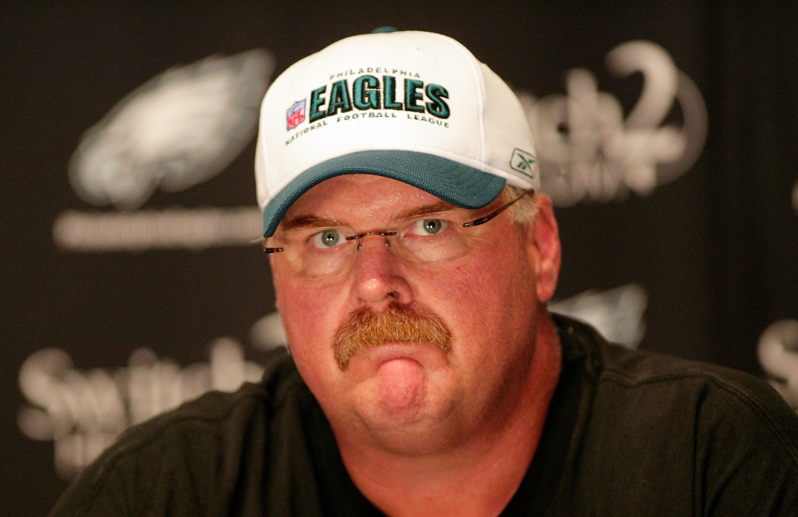 PHILADELPHIA - AUGUST 15:  Head coach Andy Reid of the Philadelphia Eagles speaks at a press conference regarding Michael Vick at the NovaCare Complex on August 15, 2009 in Philadelphia, Pennsylvania.  (Photo by Len Redkoles/Getty Images)