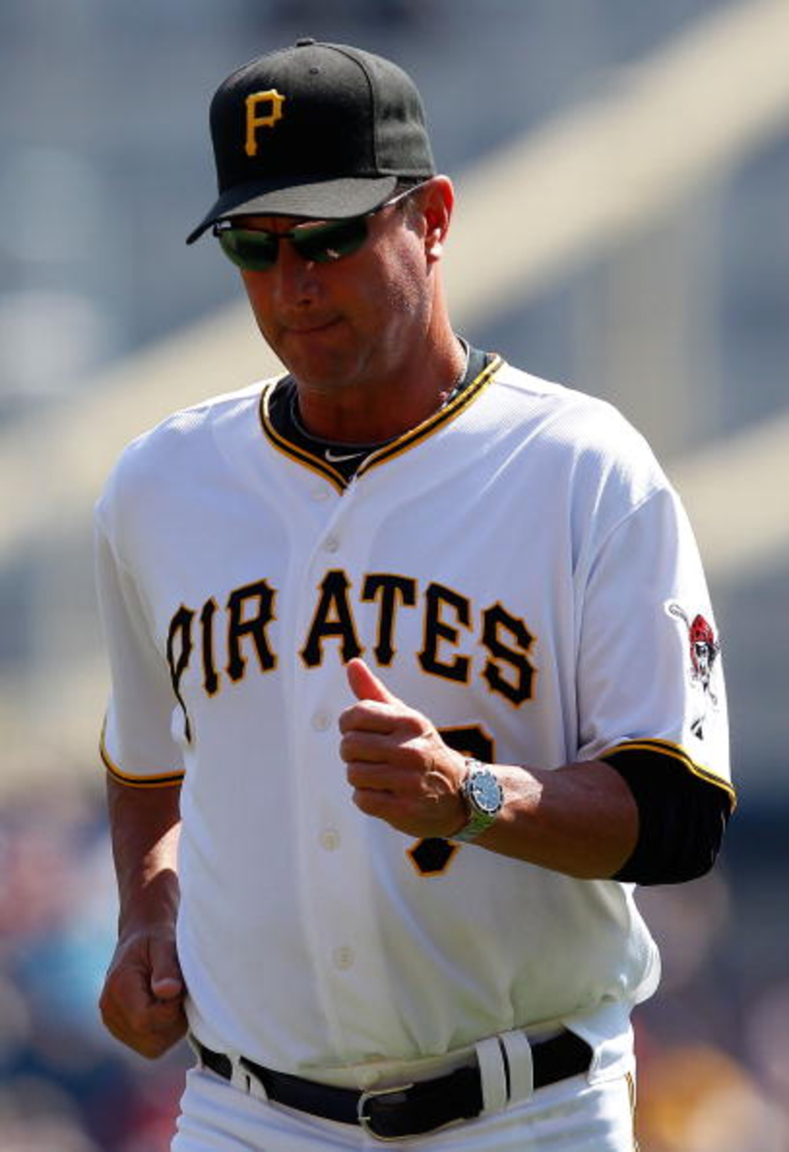 PITTSBURGH - SEPTEMBER 23: Manager John Russell #7 of the Pittsburgh Pirates jobs back to the dugout after relieving Brian Burres #71 during the game against the St Louis Cardinals on September 23, 2010 at PNC Park in Pittsburgh, Pennsylvania. (Photo by PITTSBURGH - SEPTEMBER 23: Manager John Russell #7 of the Pittsburgh Pirates jobs back to the dugout after relieving Brian Burres #71 during the game against the St Louis Cardinals on September 23, 2010 at PNC Park in Pittsburgh, Pennsylvania. (Photo by