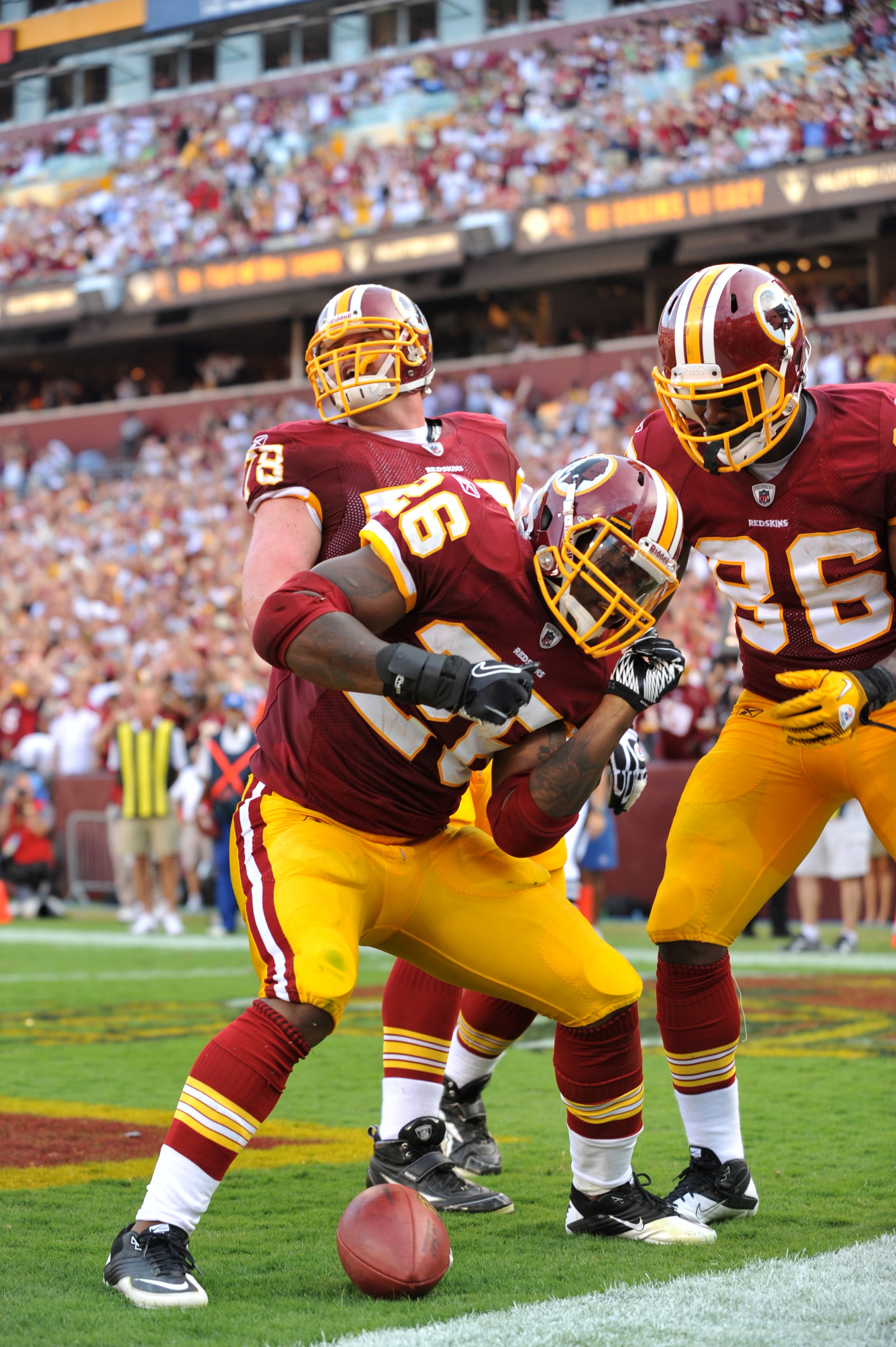 LANDOVER, MD - SEPTEMBER 19:  Clinton Portis #26 of the Washington Redskins celebrates a touchdown during the game against the Houston Texans at FedExField on September 19, 2010 in Landover, Maryland. The Texans defeated the Redskins in overtime 30-27. (P