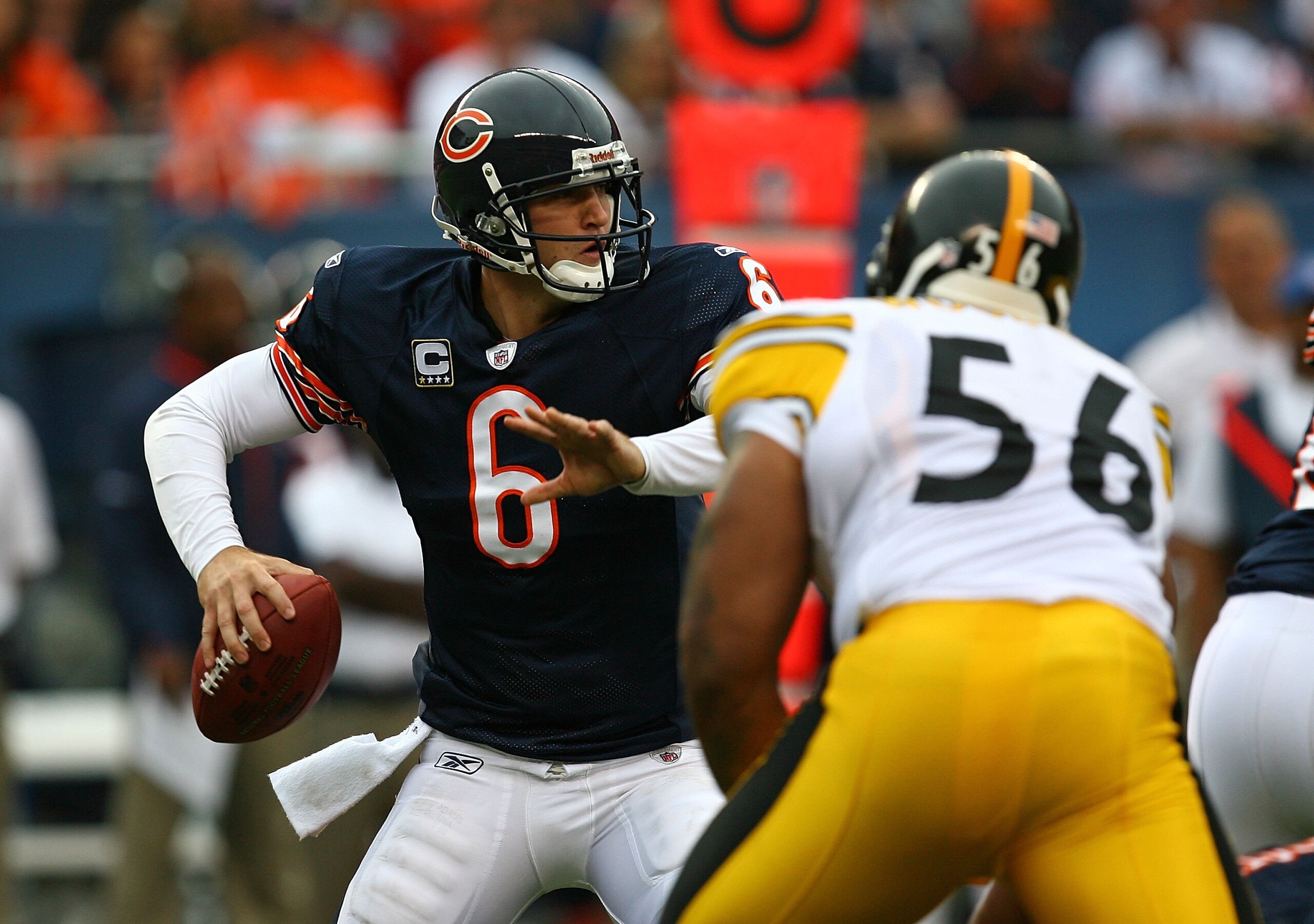 CHICAGO - SEPTEMBER 20: Jay Cutler #6 of the Chicago Bears looks to pass under pressure from LaMarr Woodley #56 of the Pittsburgh Steelers at Soldier Field on September 20, 2009 in Chicago, Illinois. The Bears defeated the Steelers 17-14. (Photo by Jonath